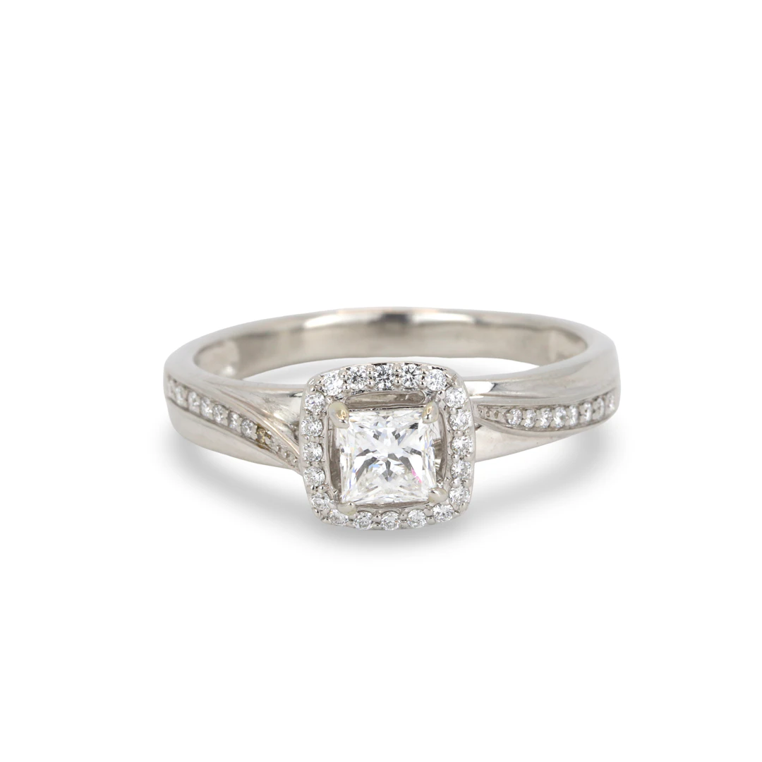 PLATINUM (1.06CT) DIAMOND HALO RING.