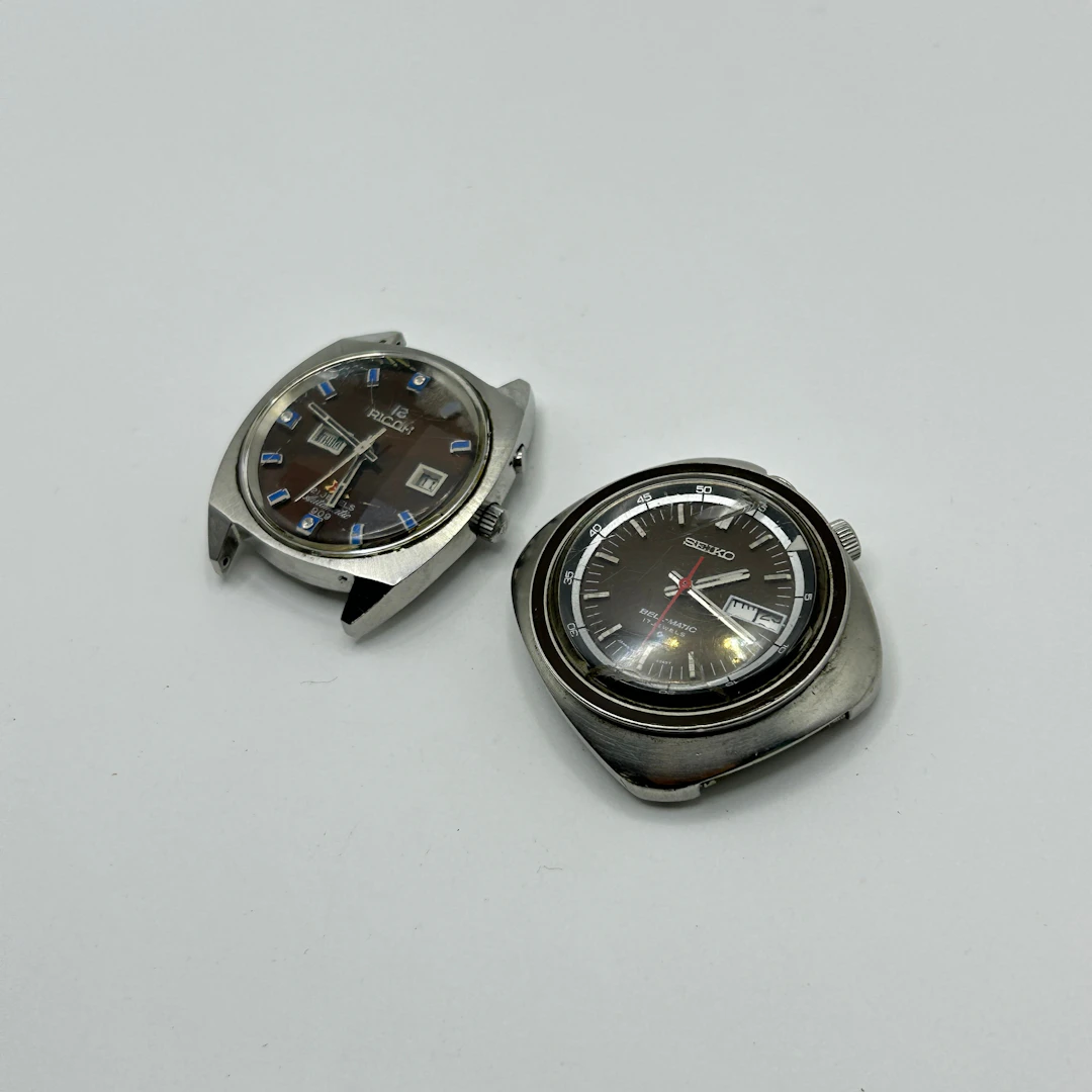 VINTAGE RICOH AND SEIKO WATCHES.
