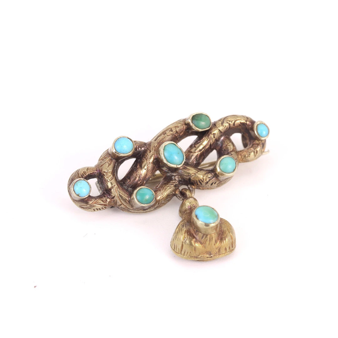 9CT GOLD TURQUOISE BROOCH.