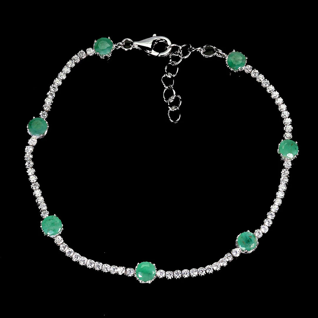 EMERALD AND SILVER BRACELET.
