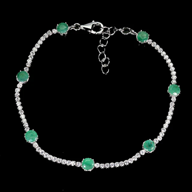 EMERALD AND SILVER BRACELET.