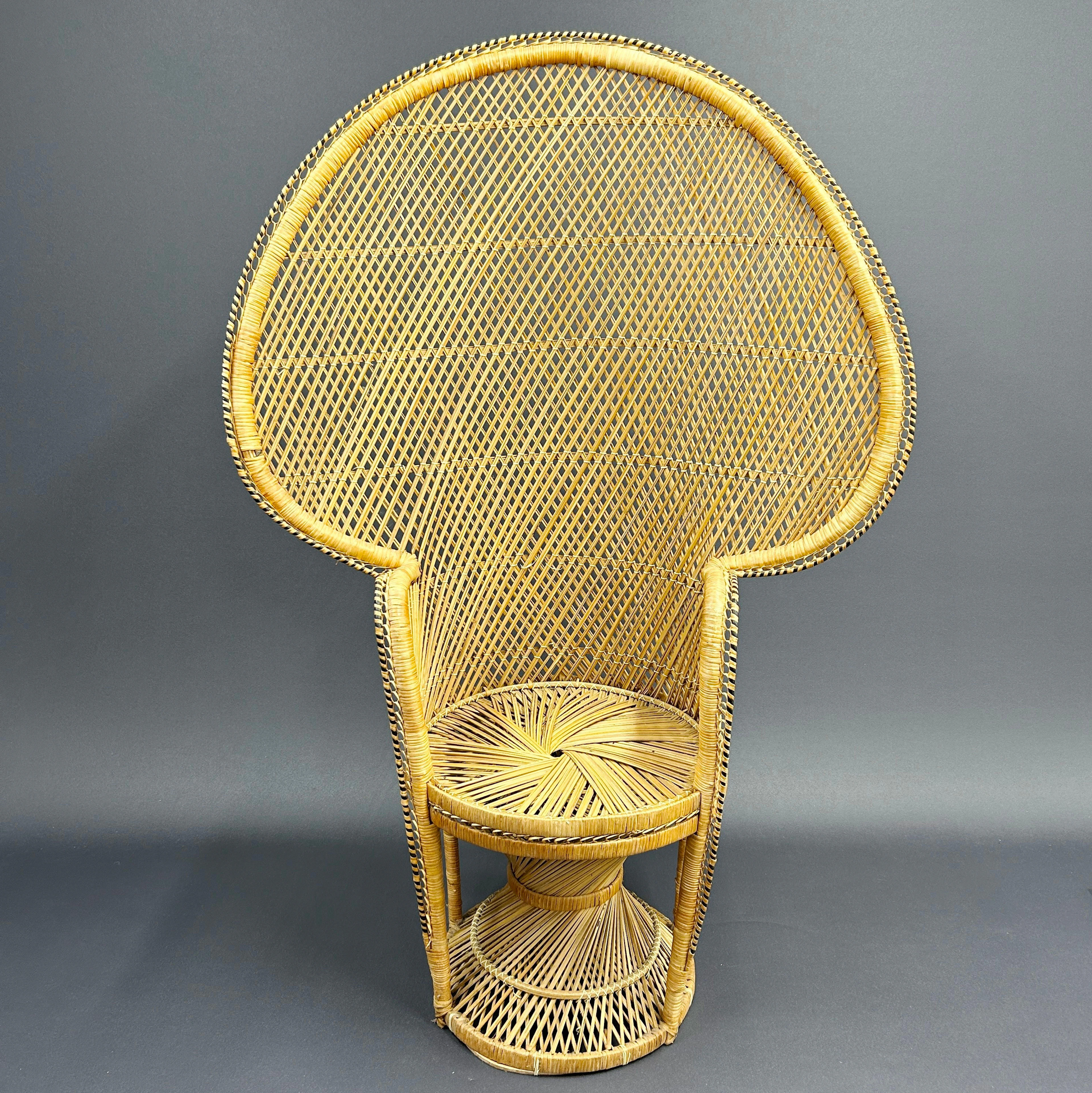 CANE PEACOCK CHAIR.