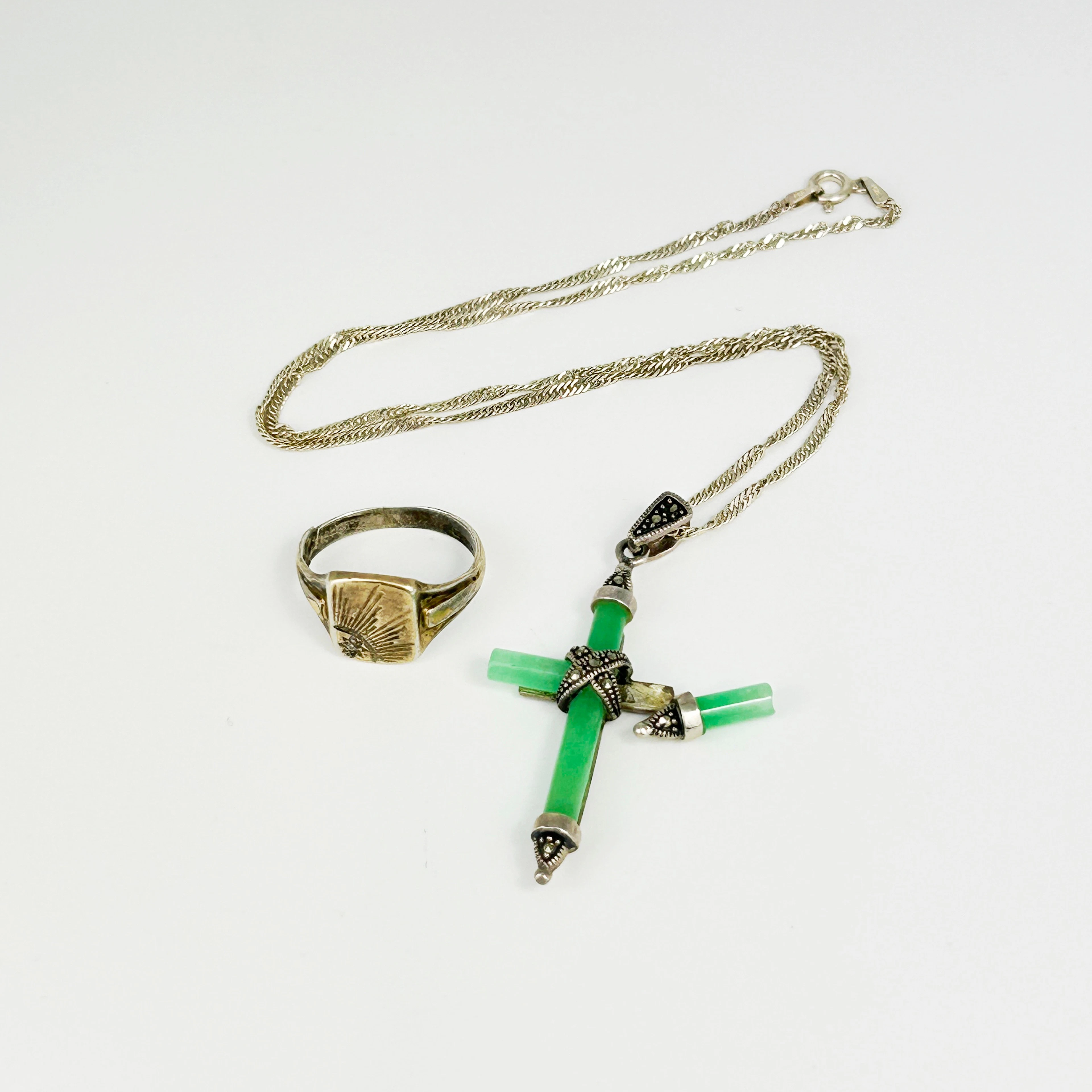 SILVER AND JADE CROSS AND RING.