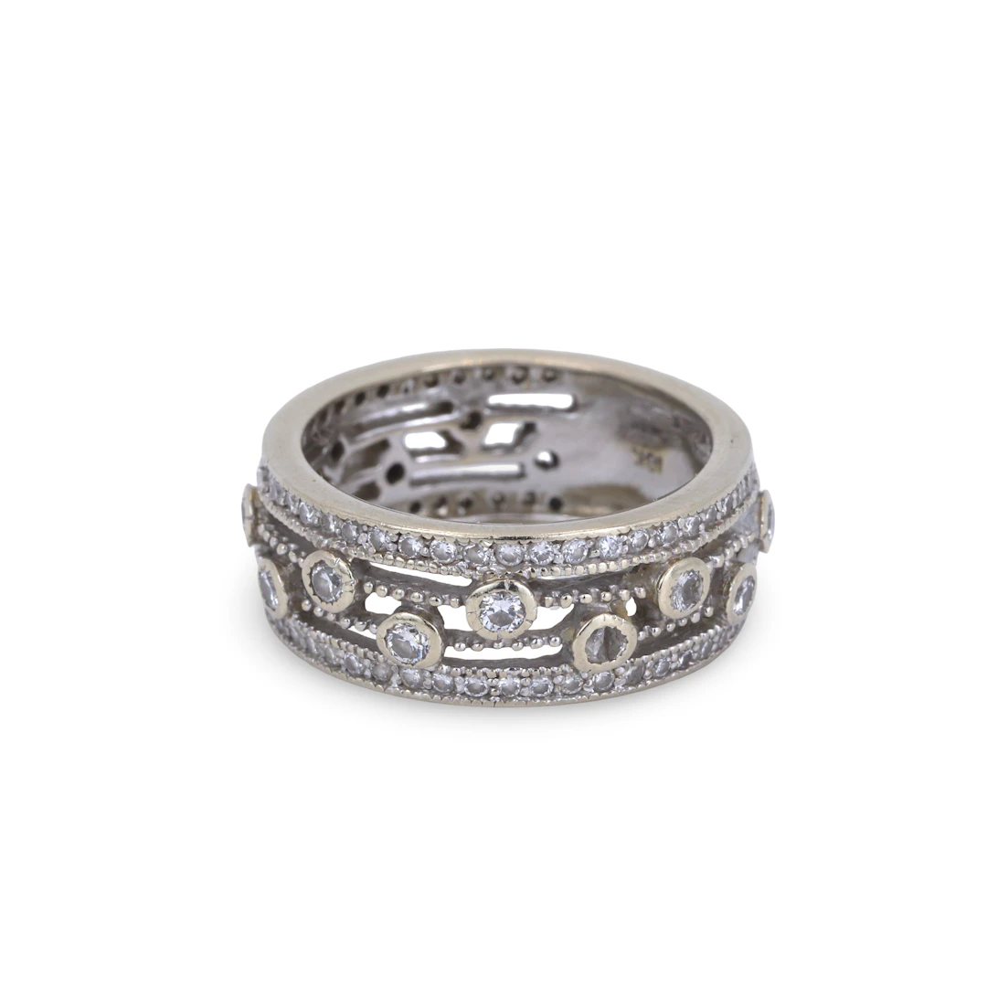 18CT GOLD DIAMOND RING.