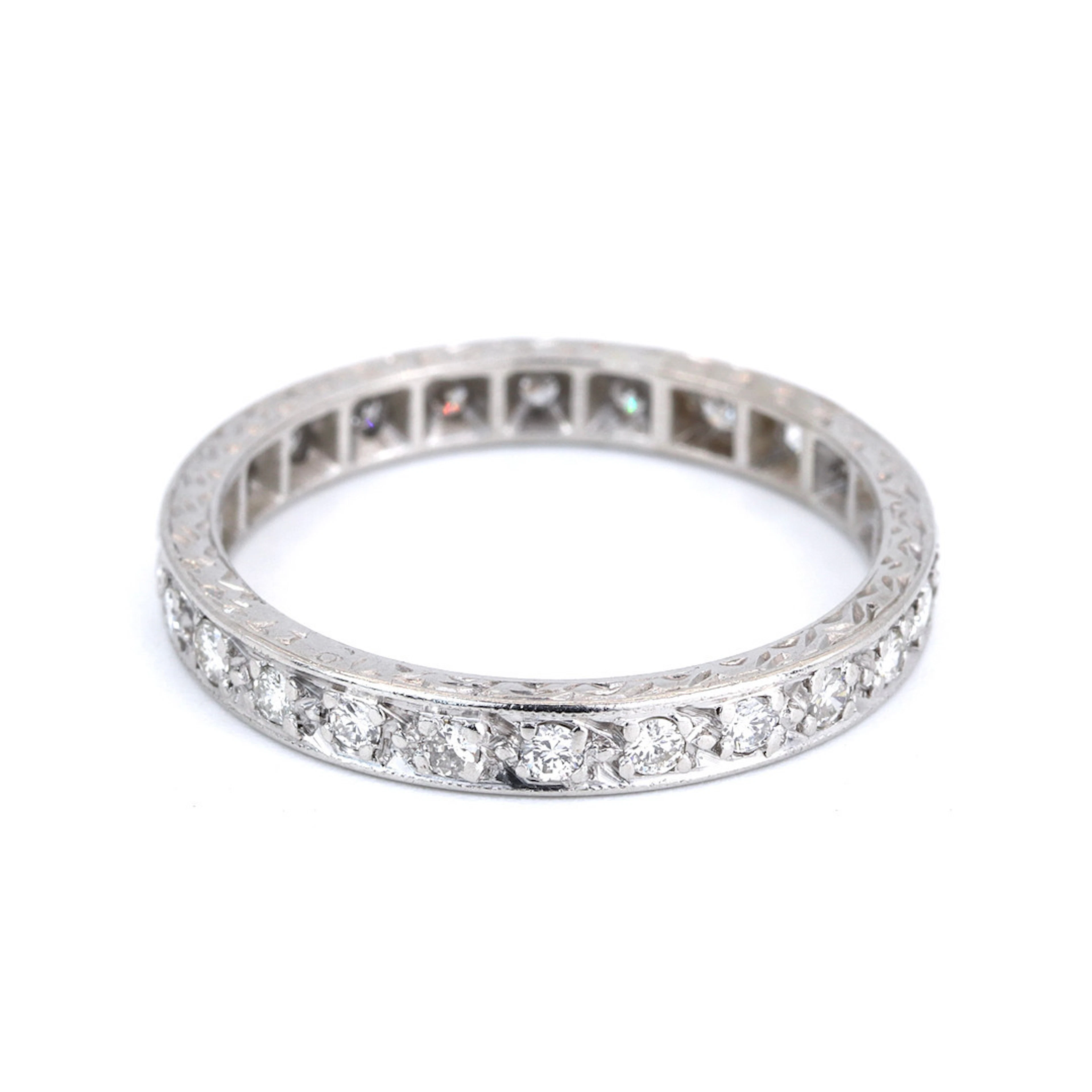 PALLADIUM DIAMOND ETERNITY RING.