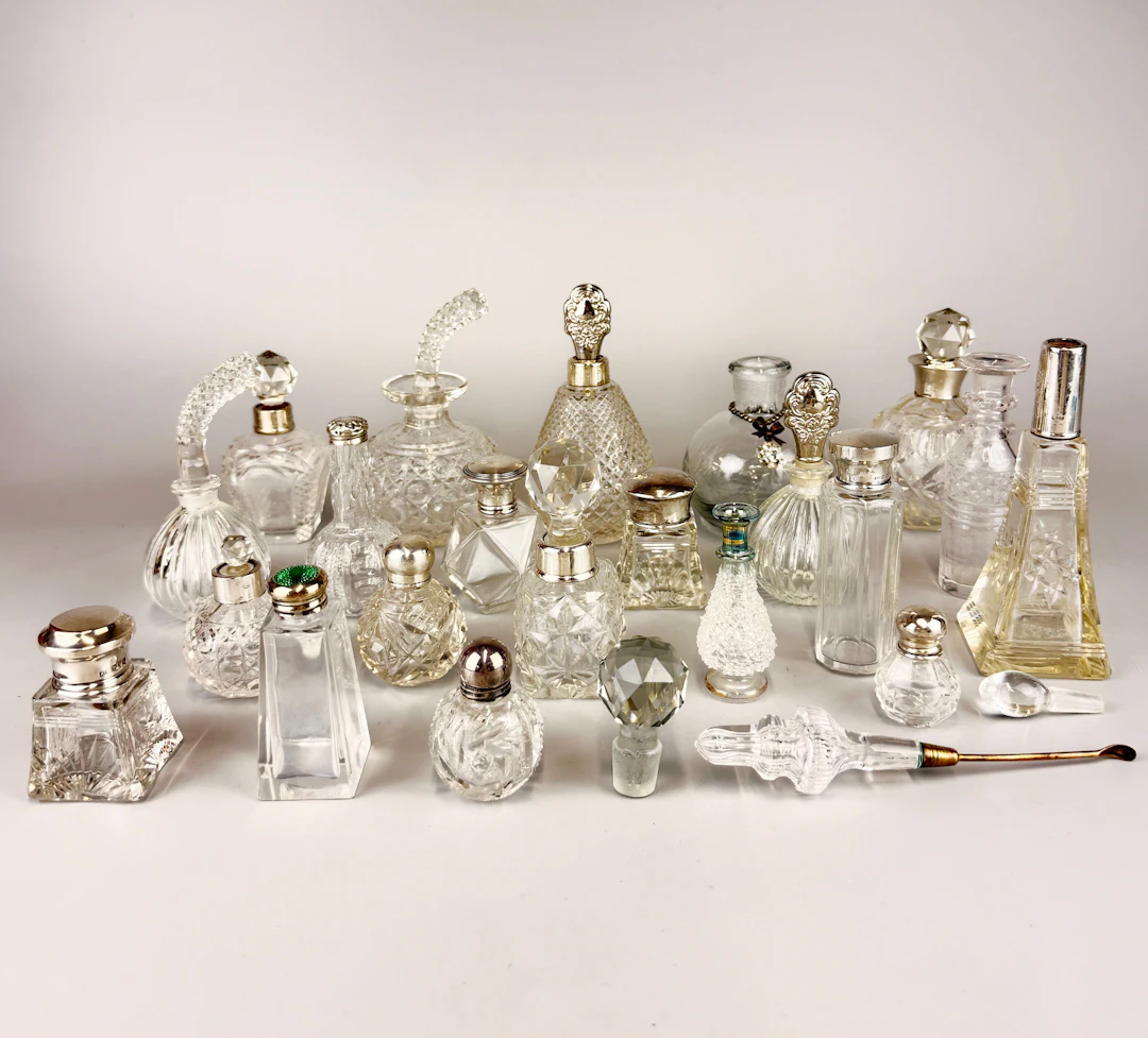 SILVER & GLASS PERFUME BOTTLES.