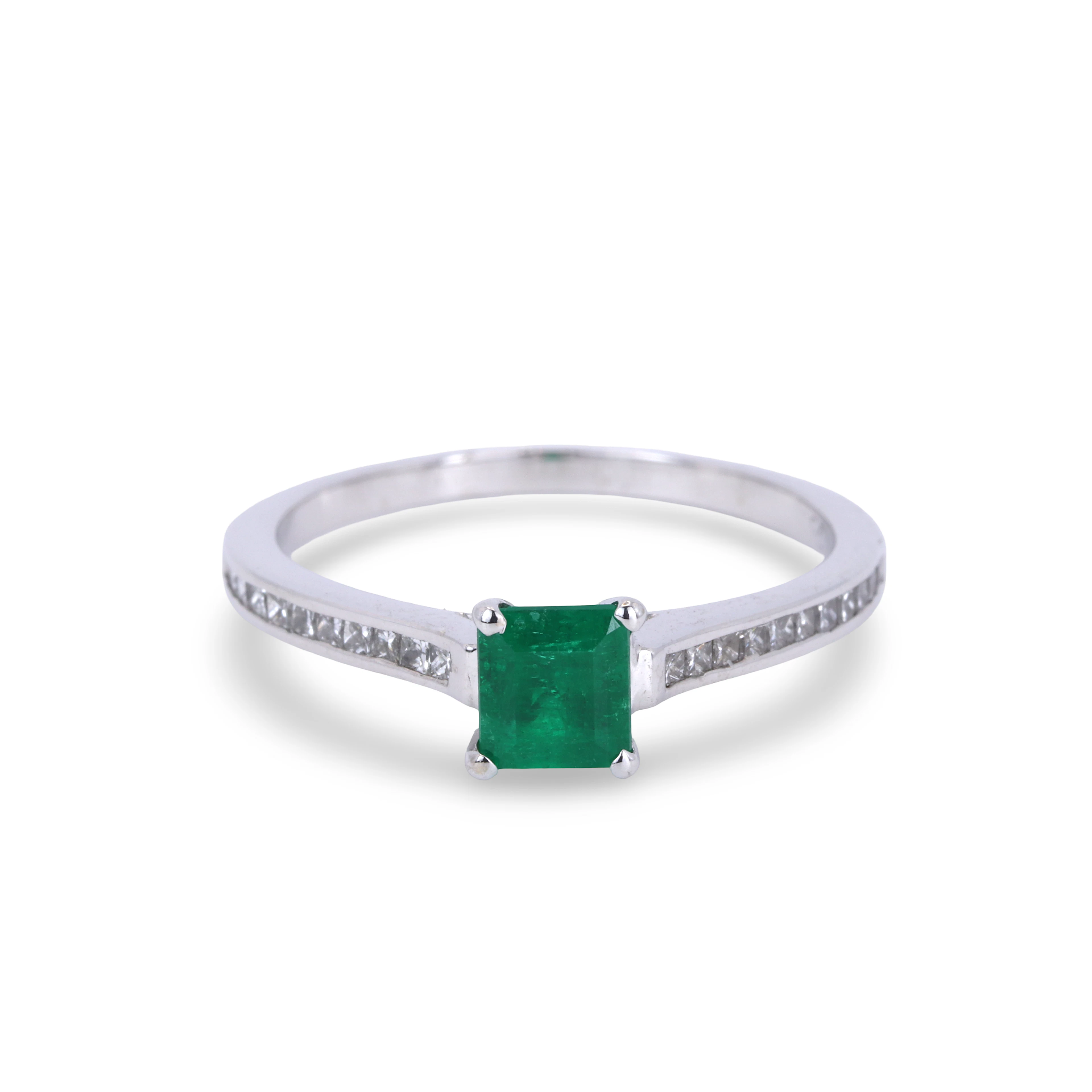 18CT GOLD EMERALD & DIAMOND RING.