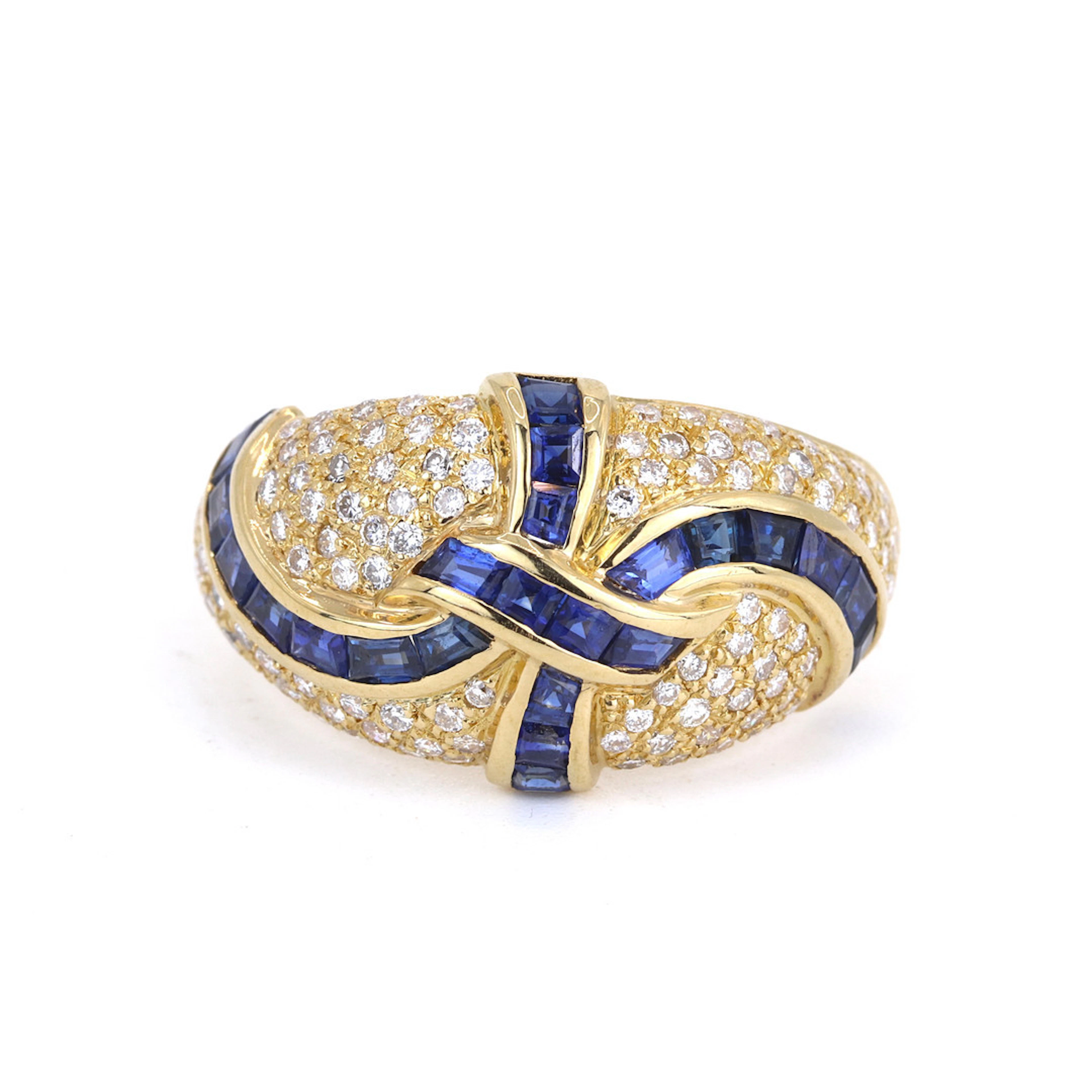 18CT GOLD SAPPHIRE & DIAMOND RING.