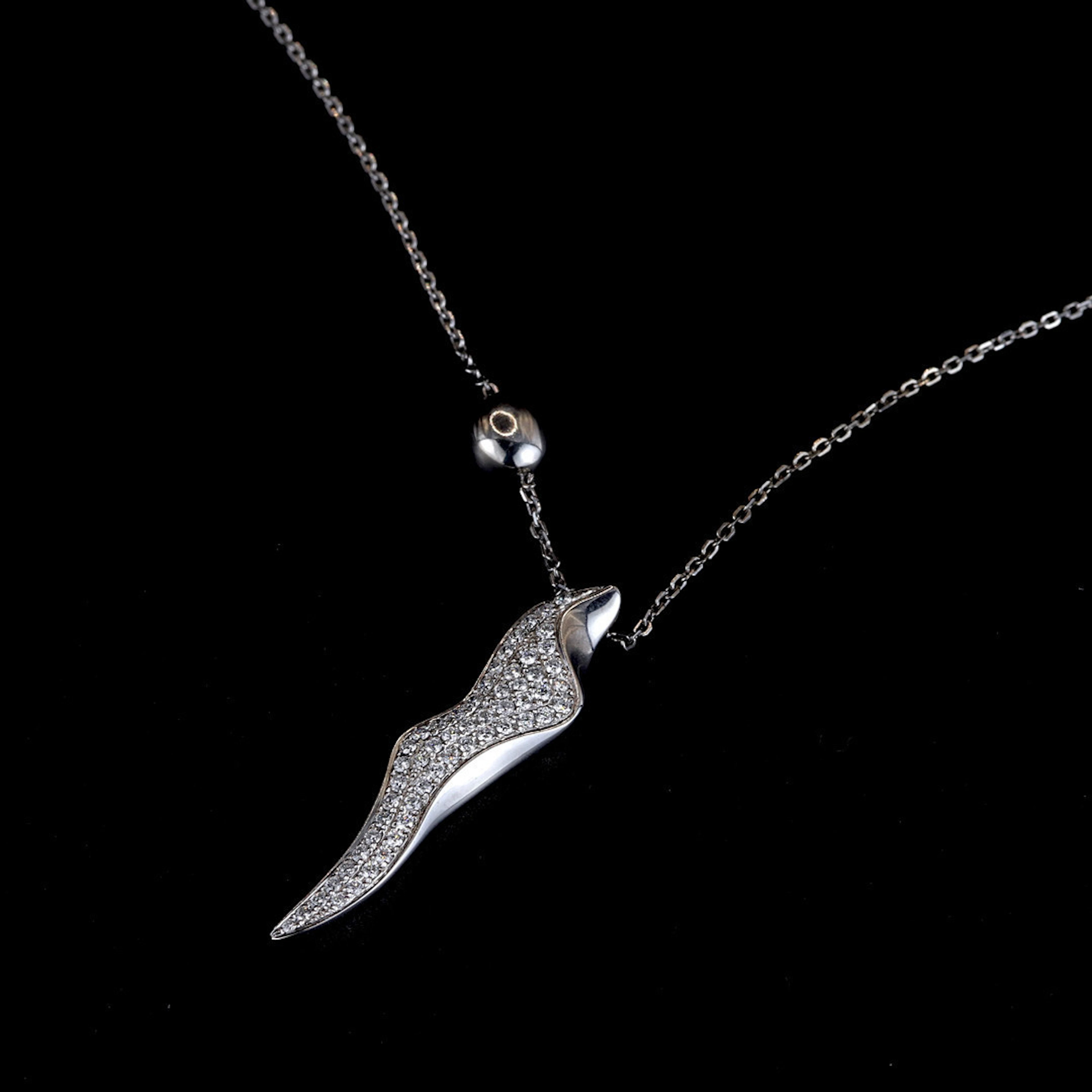 18CT WHITE GOLD DIAMOND SET NECKLACE.