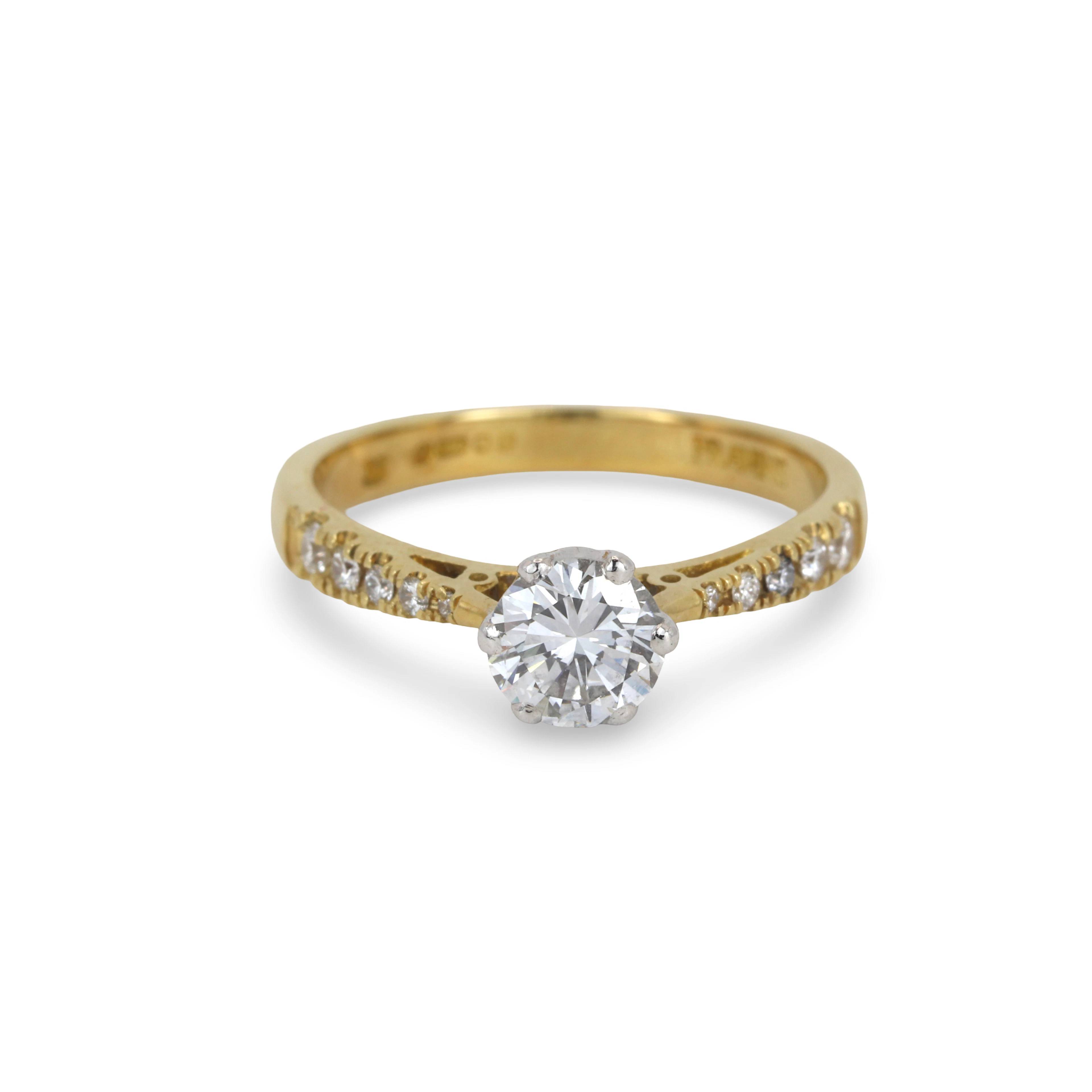 18CT GOLD DIAMOND SOLITAIRE RING.