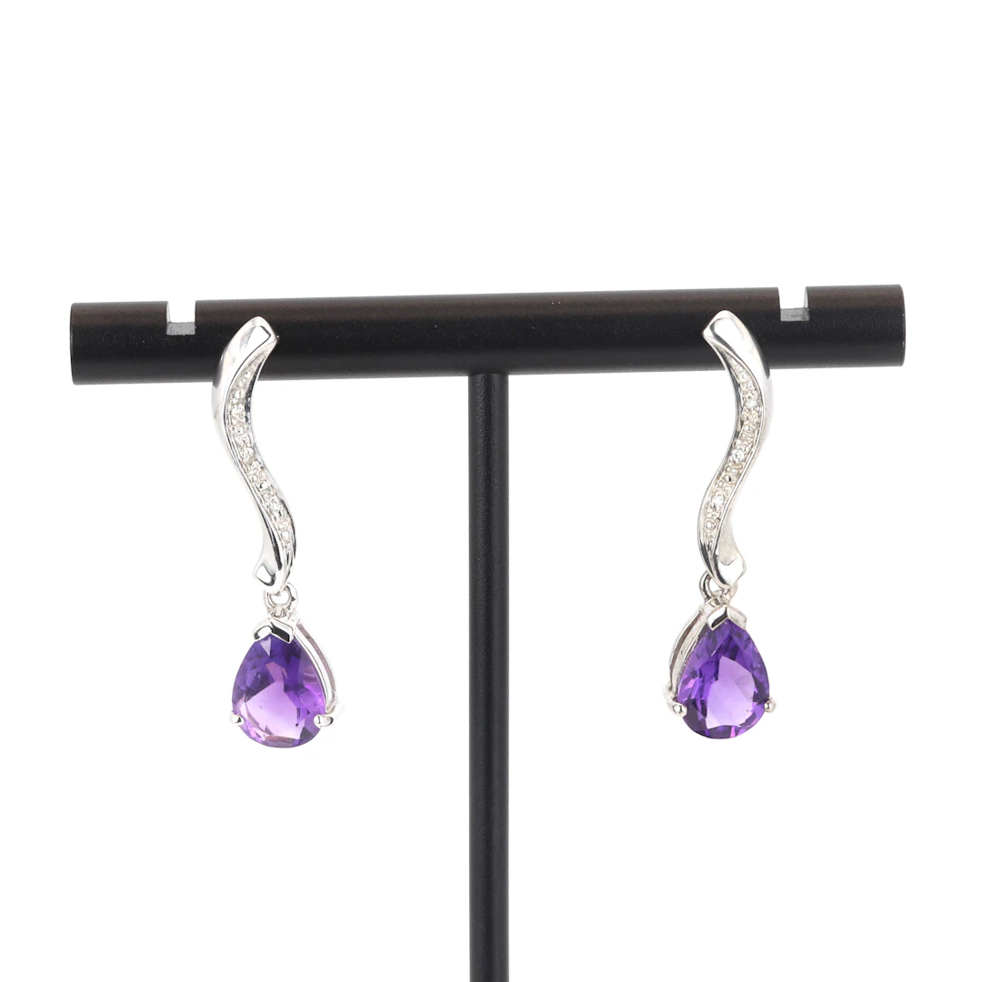 9CT AMETHYST AND DIAMOND EARRINGS.