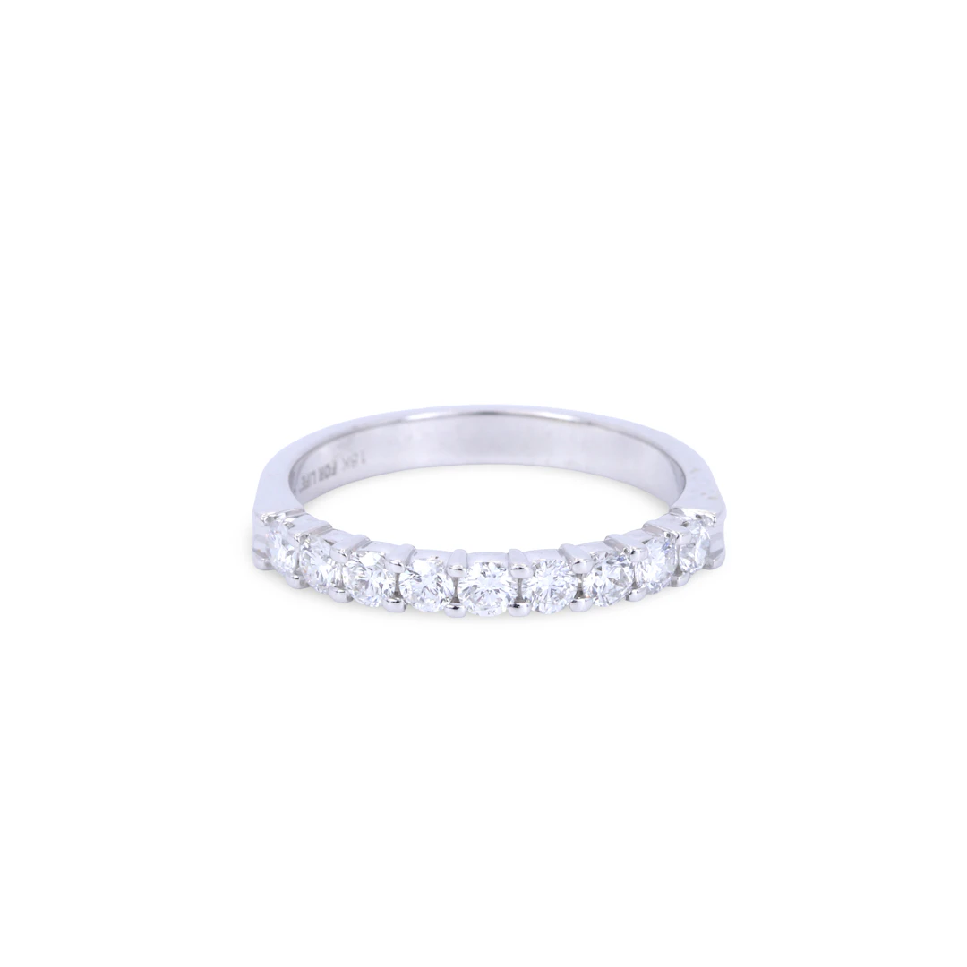 18CT GOLD DIAMOND HALF ETERNITY RING.