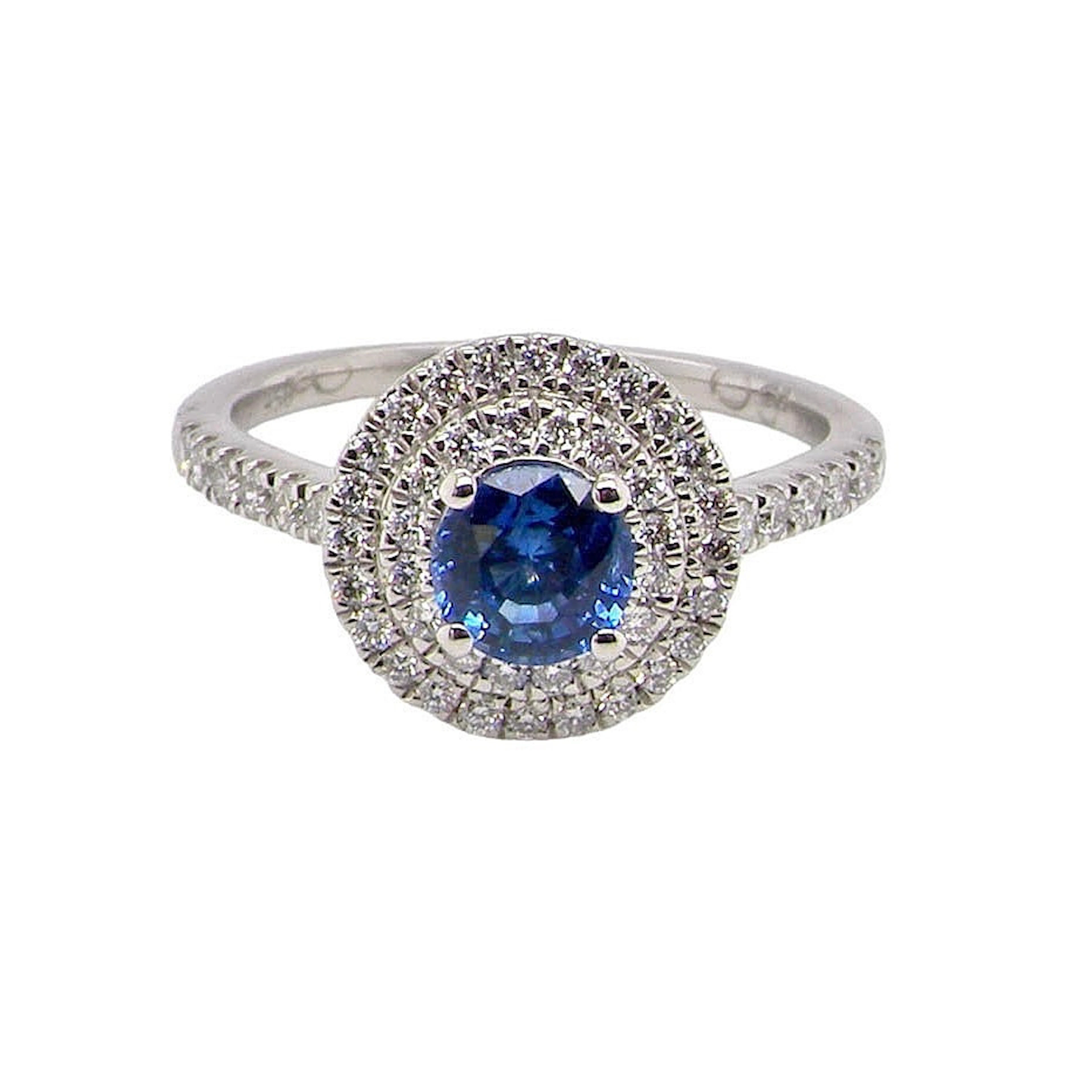 PLATINUM SAPPHIRE & DIAMOND RING.