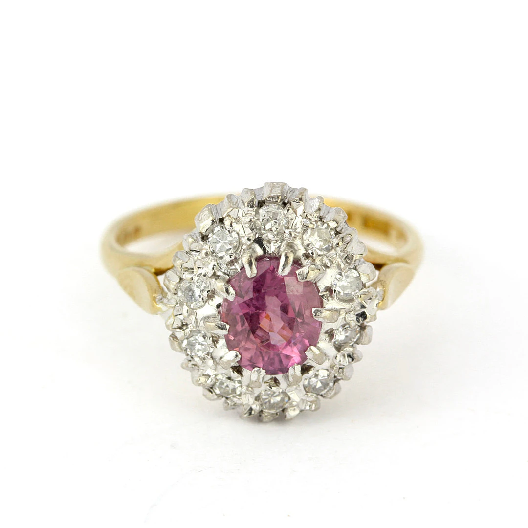 18CT GOLD DIAMOND & TOURMALINE RING.