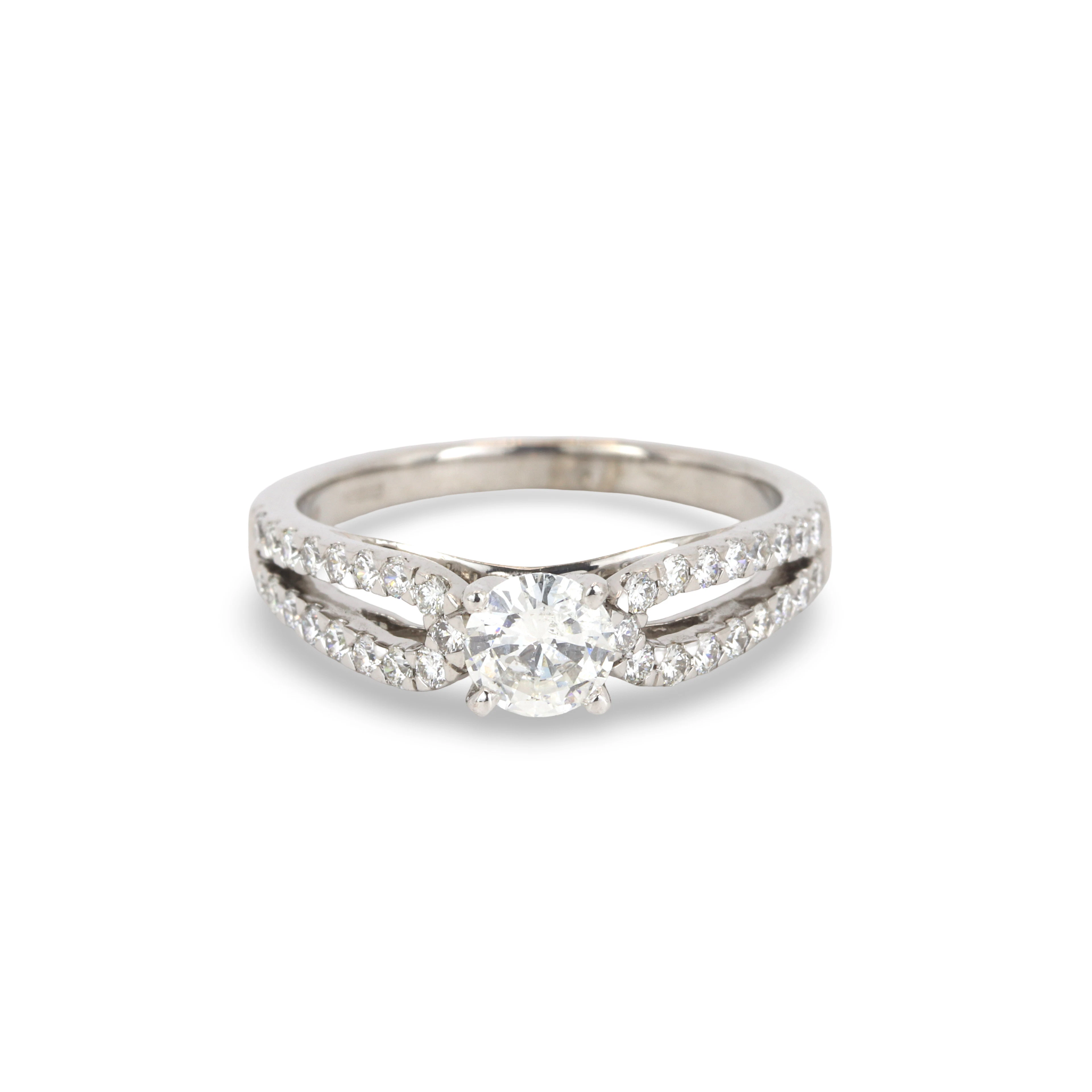 18CT GOLD DIAMOND SOLITAIRE RING.
