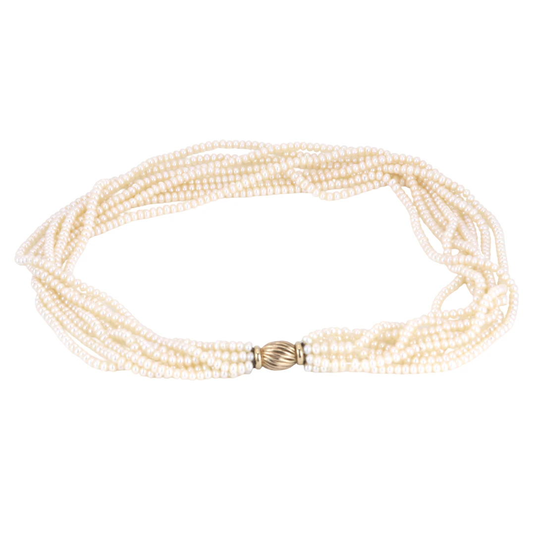 8 ROW PEARL NECKLACE ON 9CT GOLD.