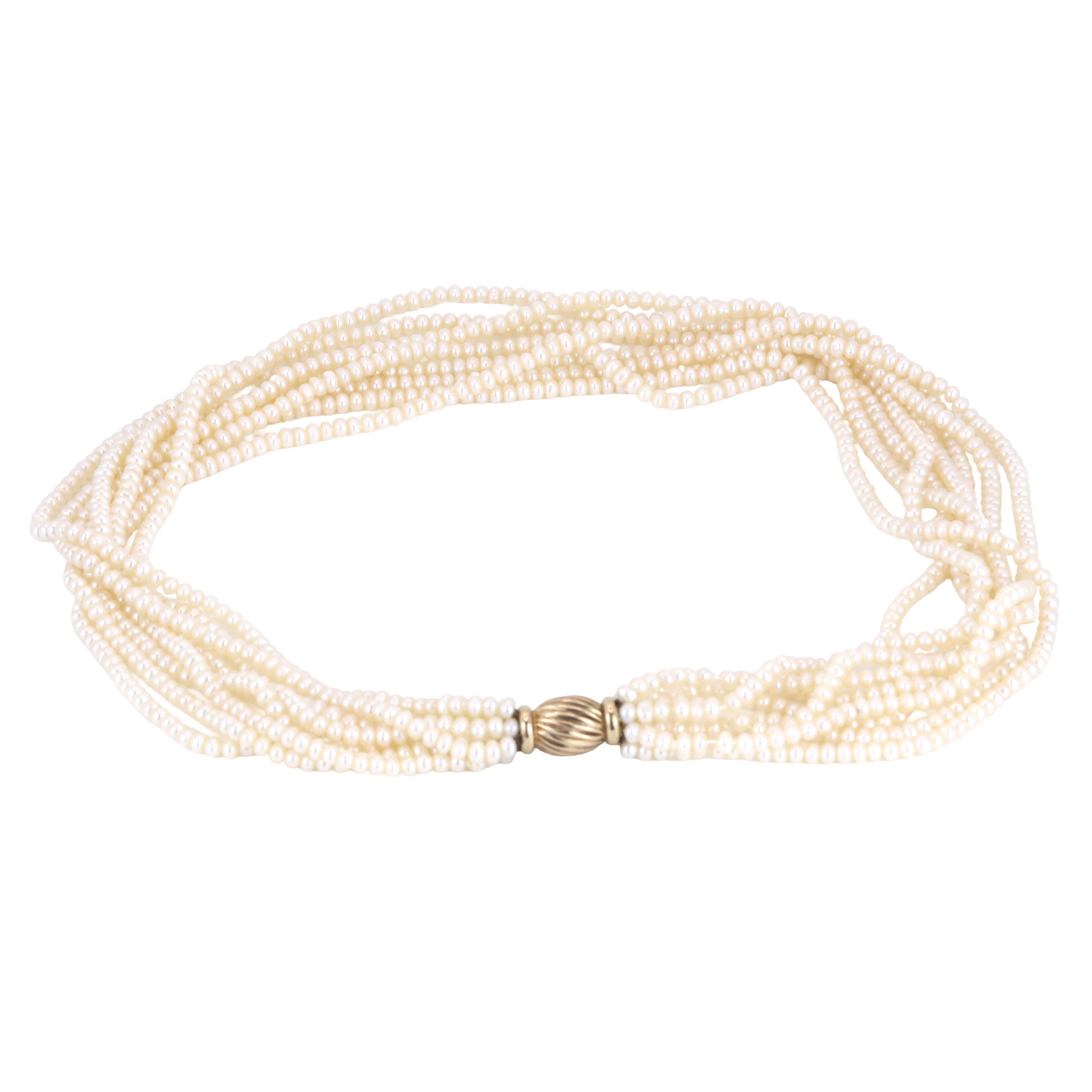 8 ROW PEARL NECKLACE ON 9CT GOLD.