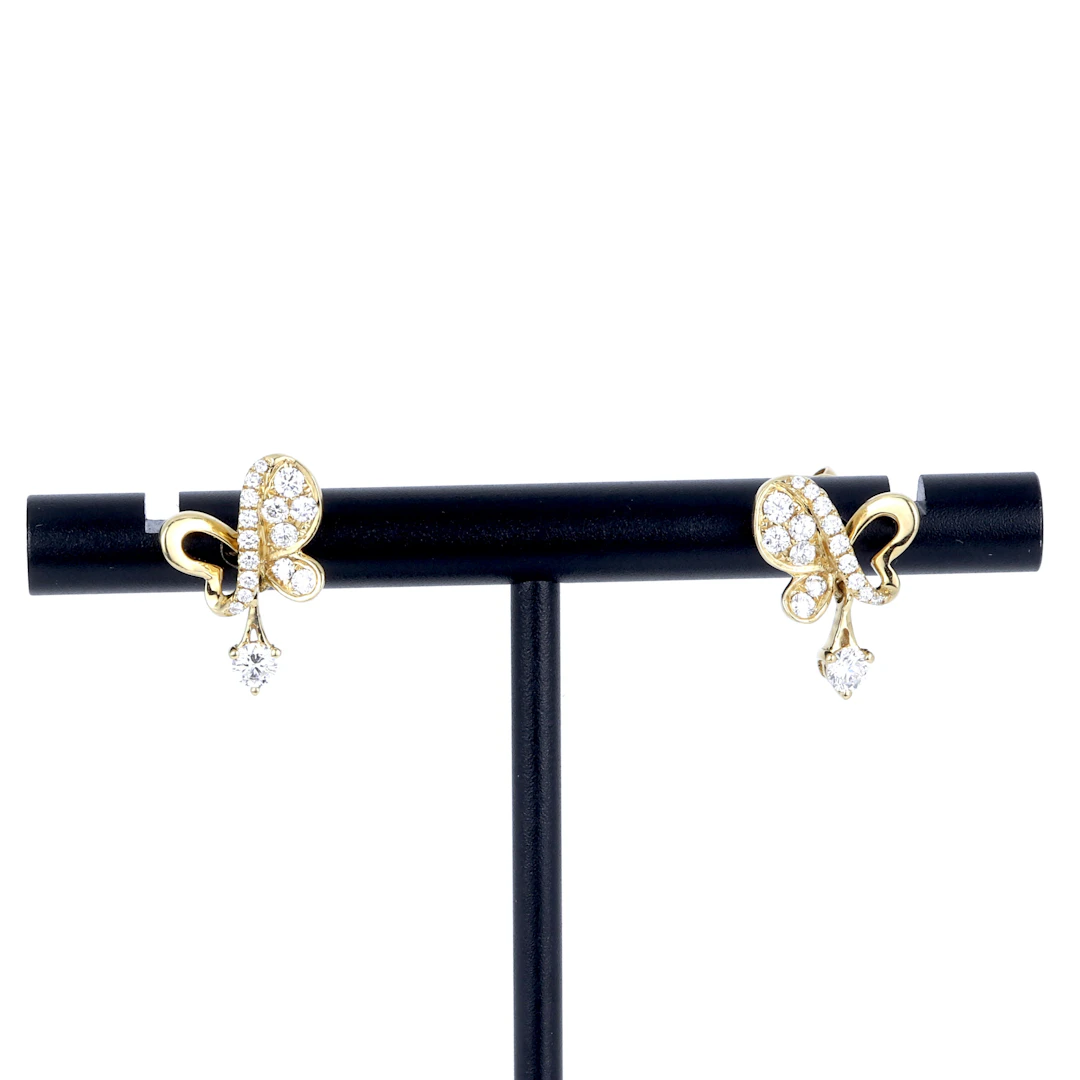 18CT GOLD DIAMOND SET EARRINGS.
