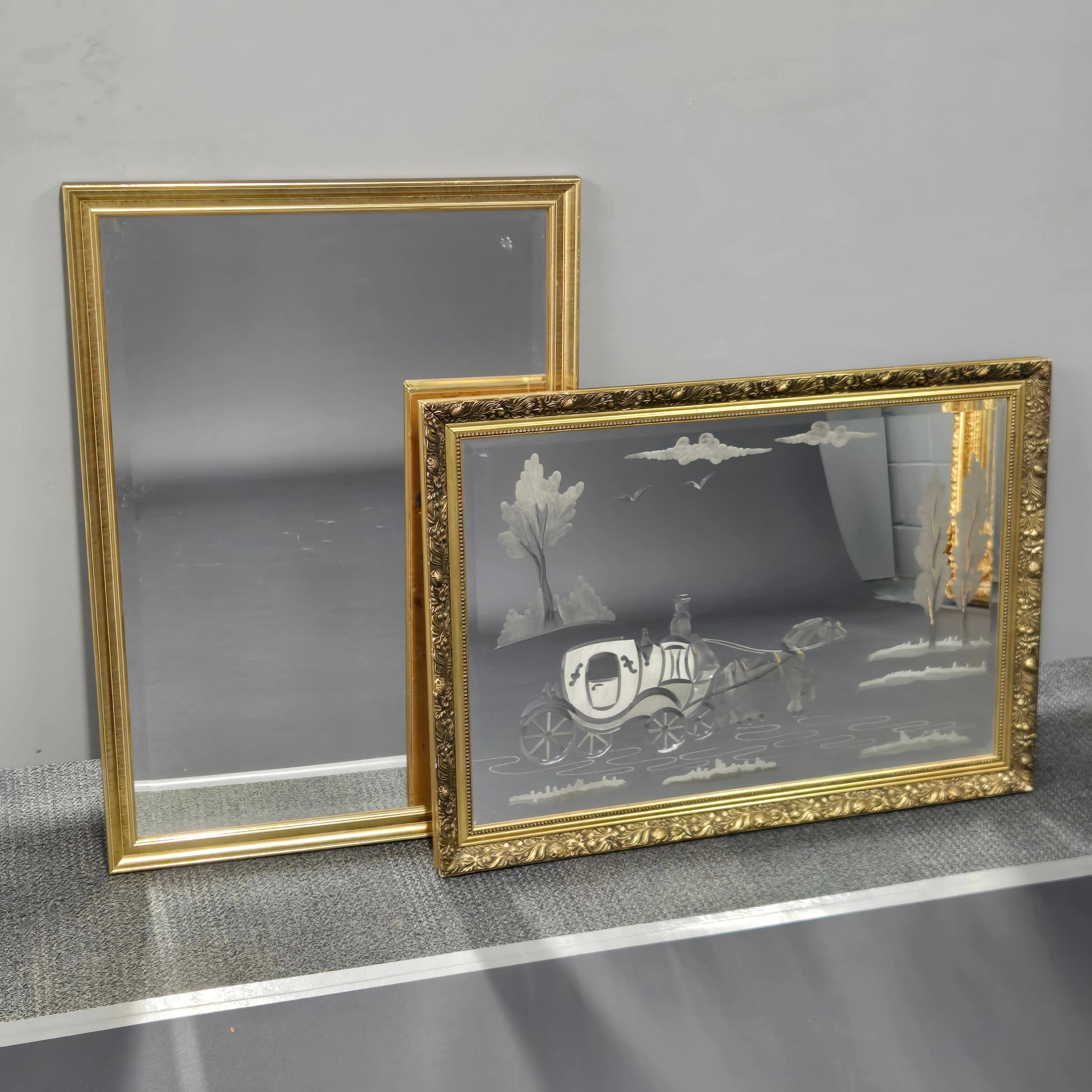 TWO GILT FRAMED MIRRORS.