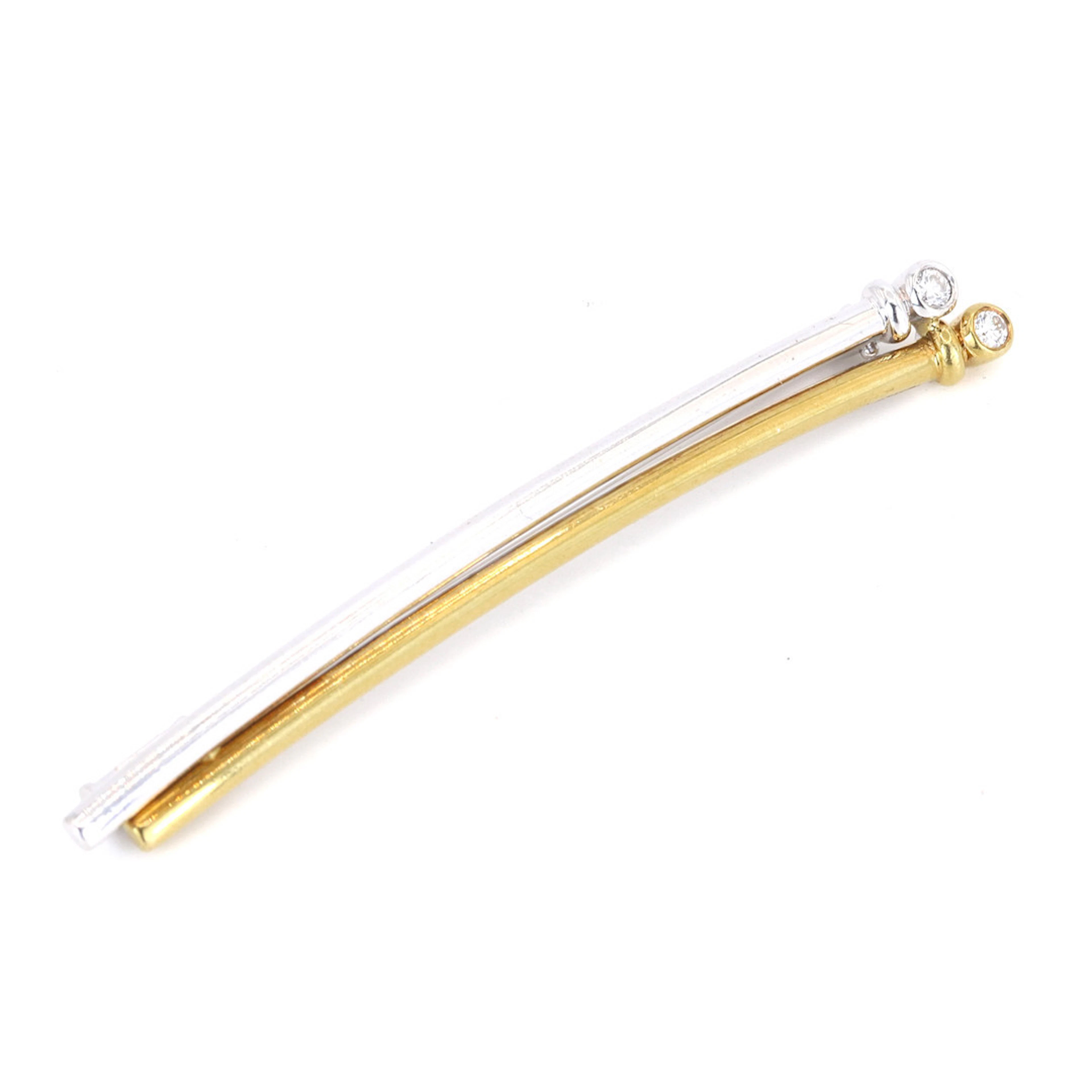 18CT GOLD DIAMOND BROOCH.