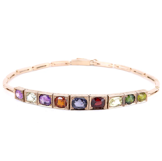 9CT GOLD GEMSTONE BRACELET.