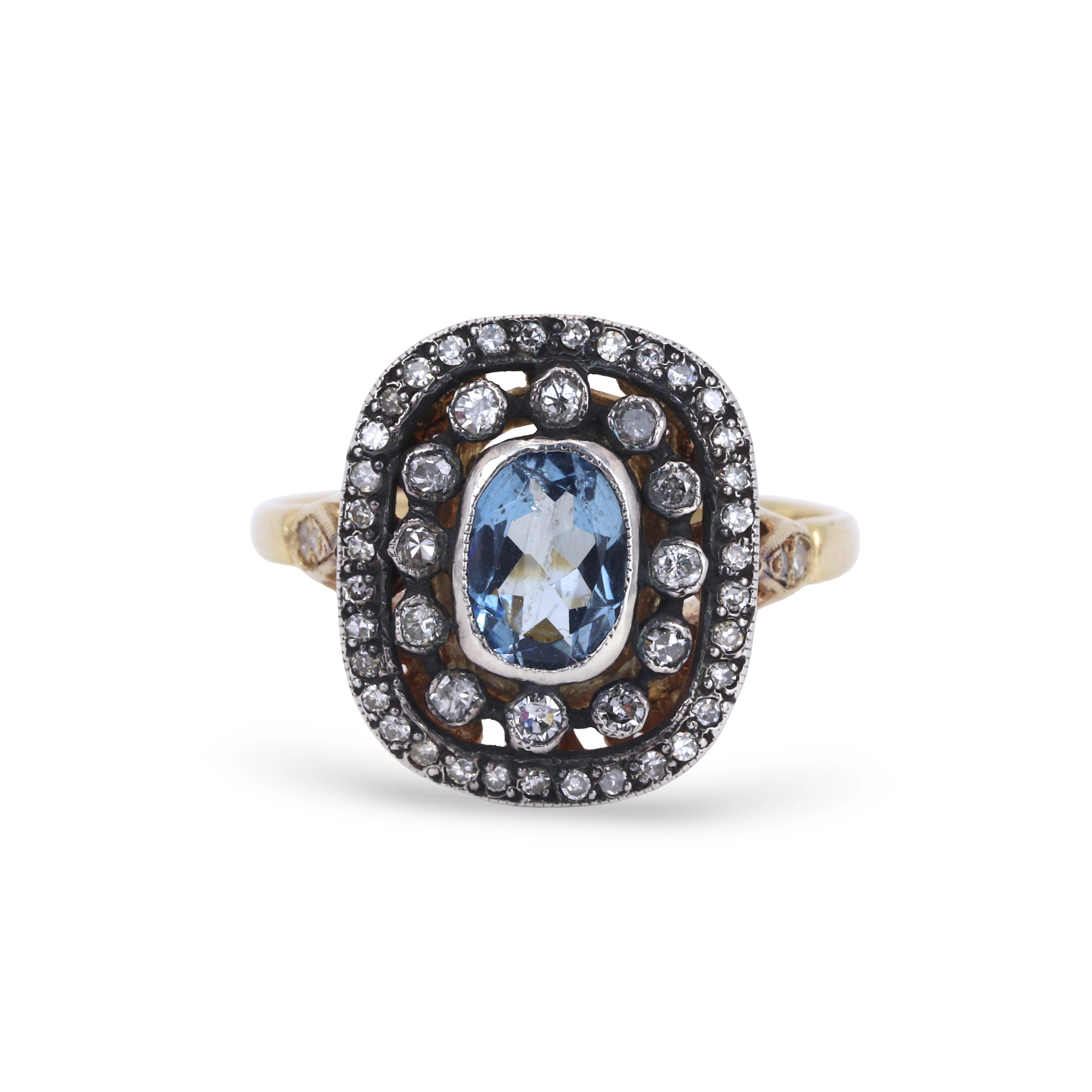 GOLD & SILVER AQUAMARINE DIAMOND RING.