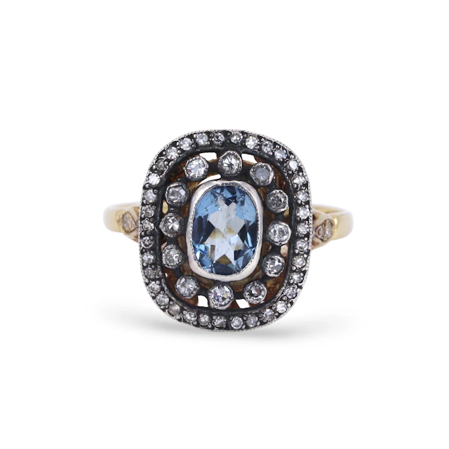 GOLD & SILVER AQUAMARINE DIAMOND RING.