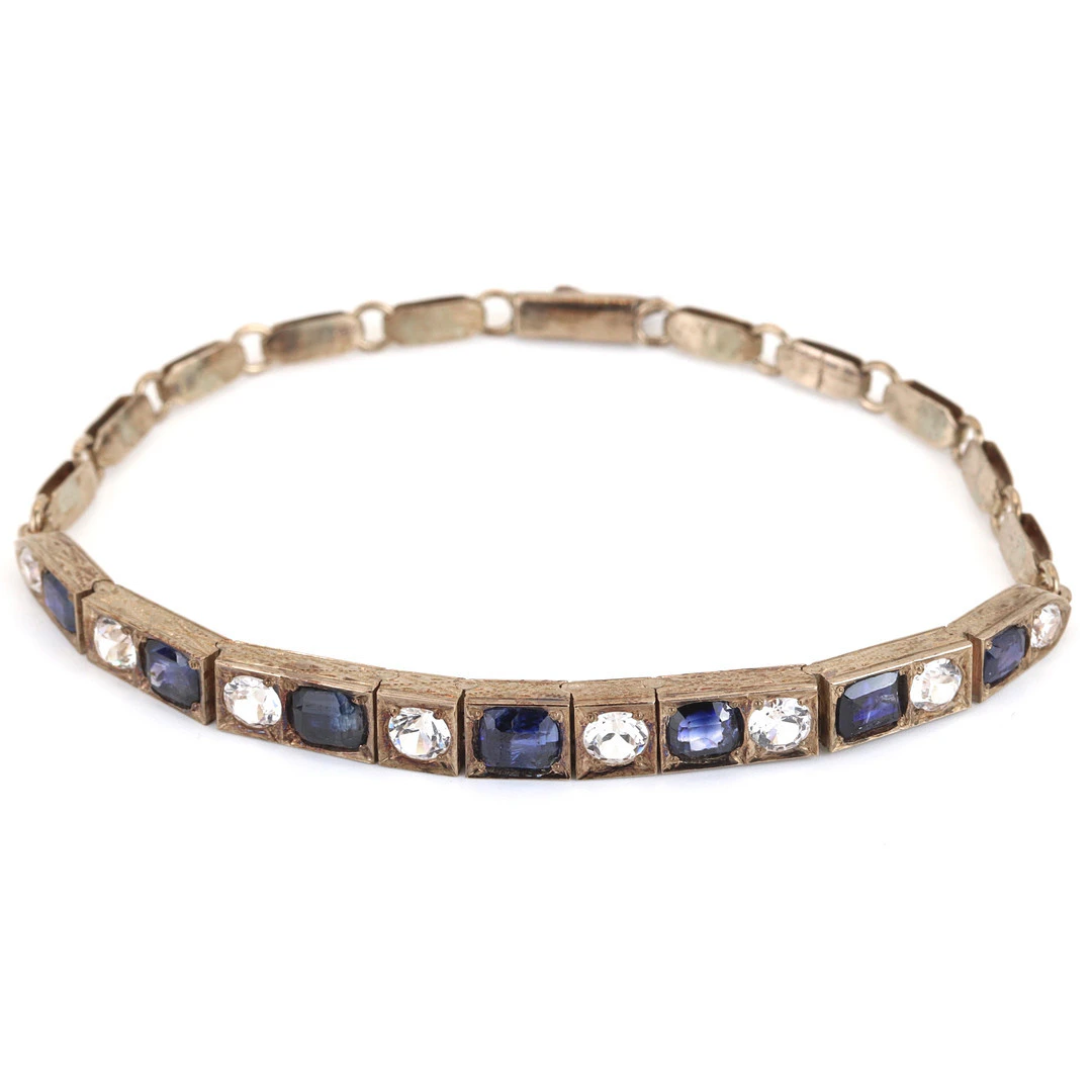 9CT GOLD BLUE & WHITE SAPPHIRE BRACELET.