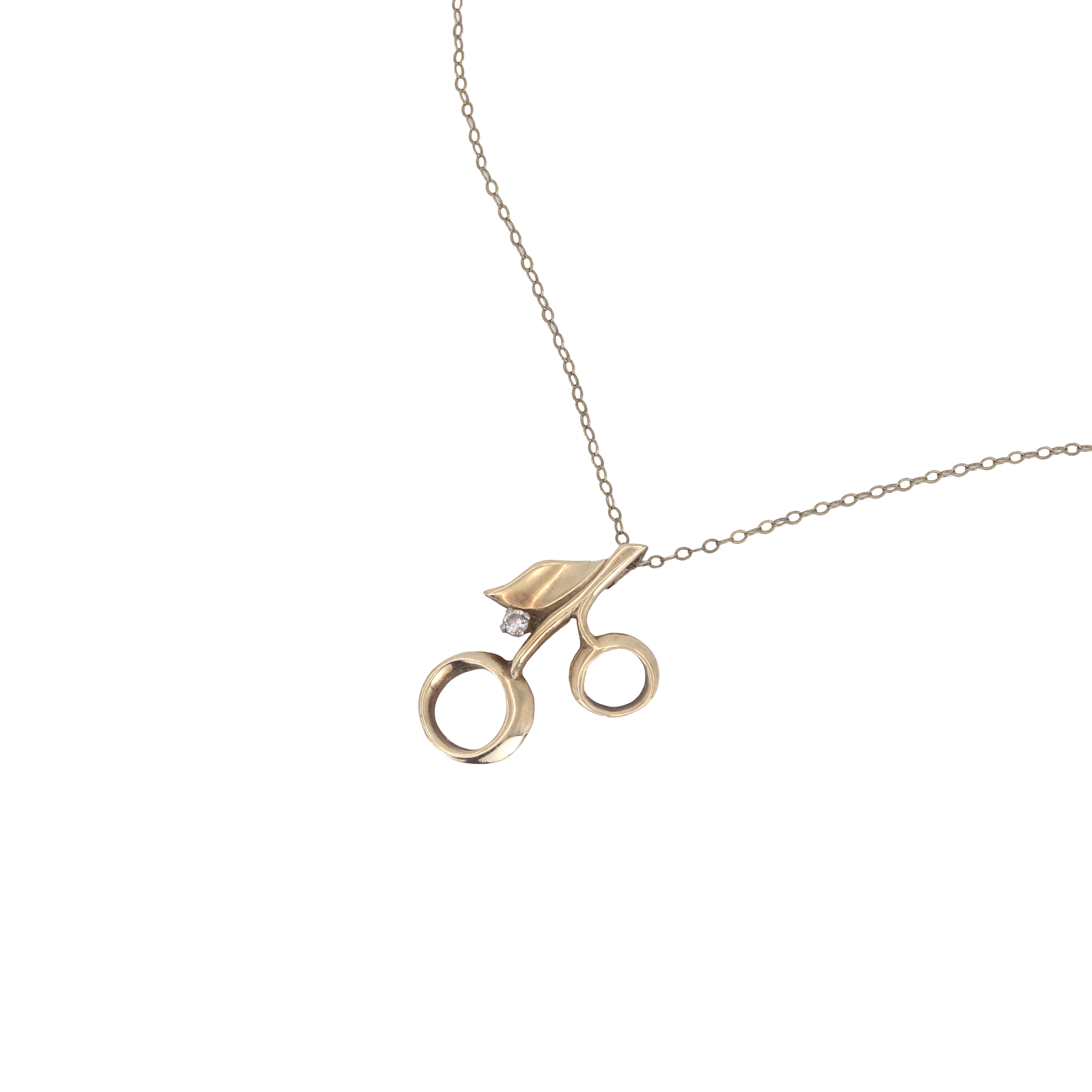 9CT DIAMOND CHERRY NECKLACE.