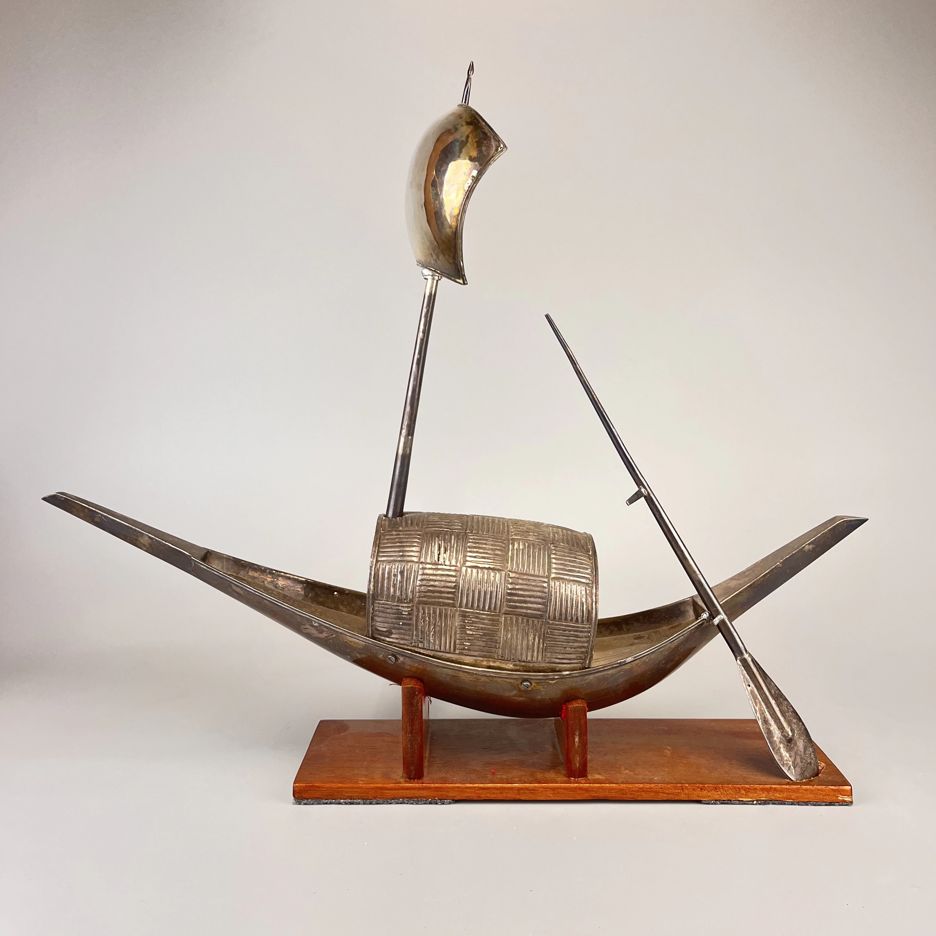 SILVERED MODEL OF A DHOW.