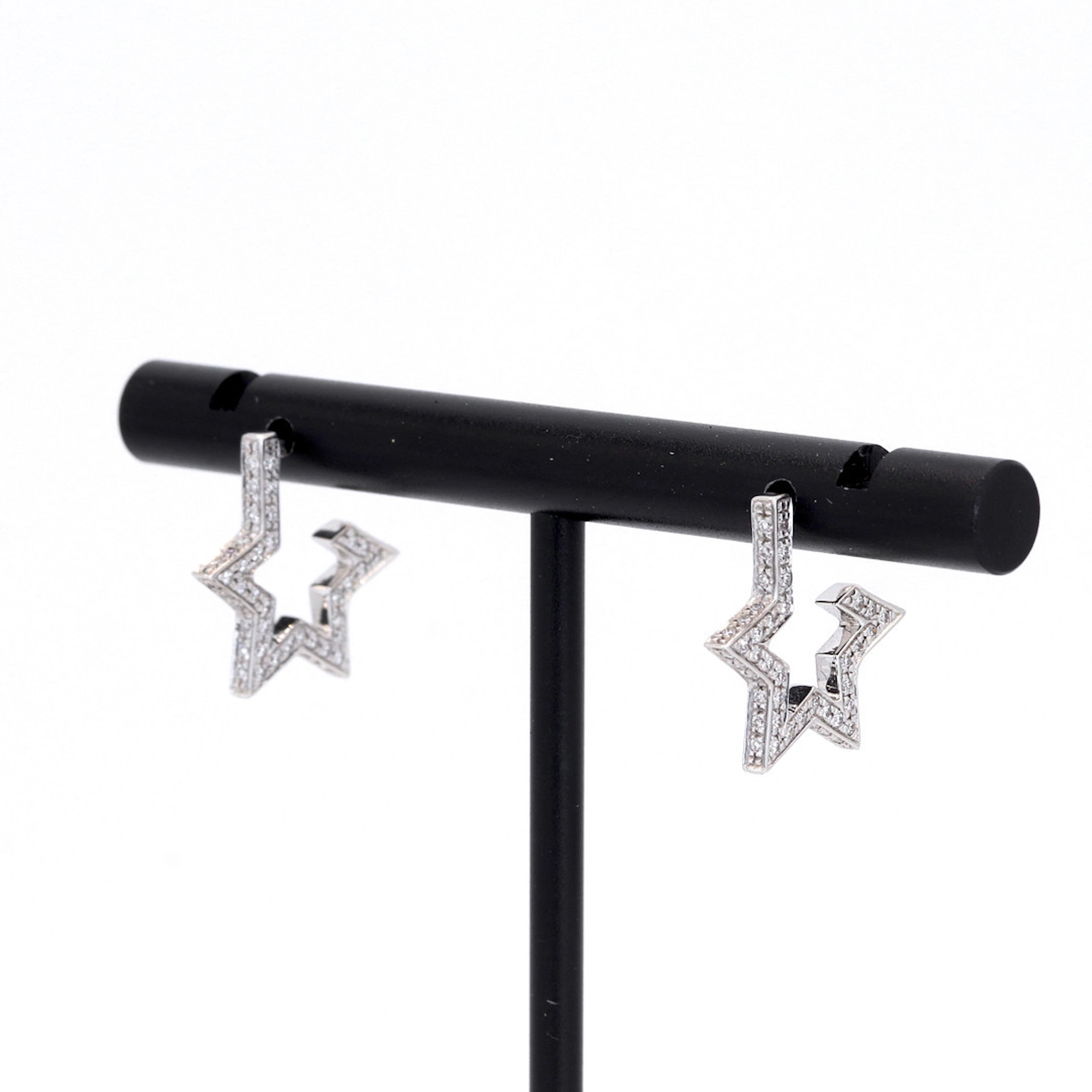 18CT STAR DIAMOND EARRINGS.