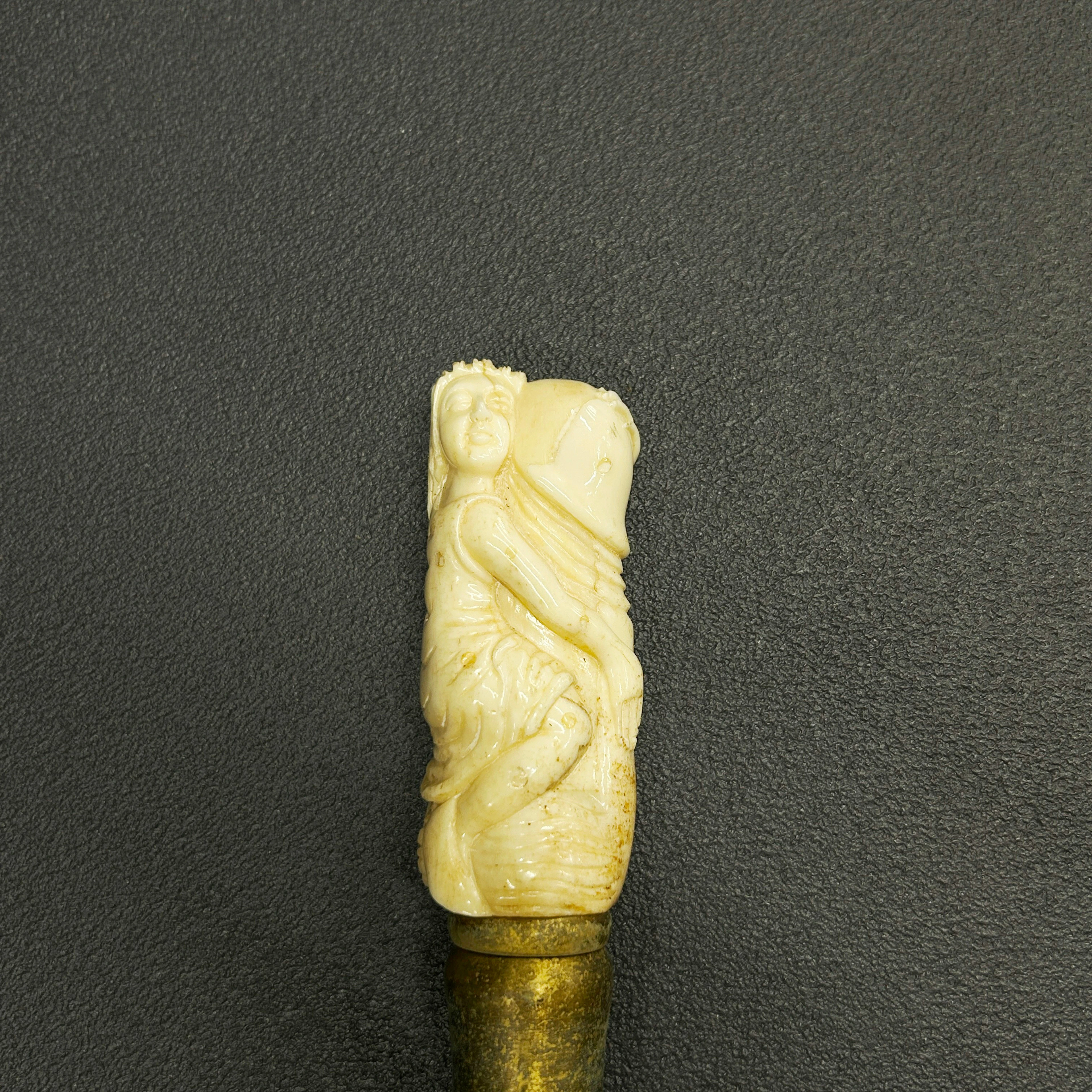 EROTIC BONE HANDLED WALKING STICK.