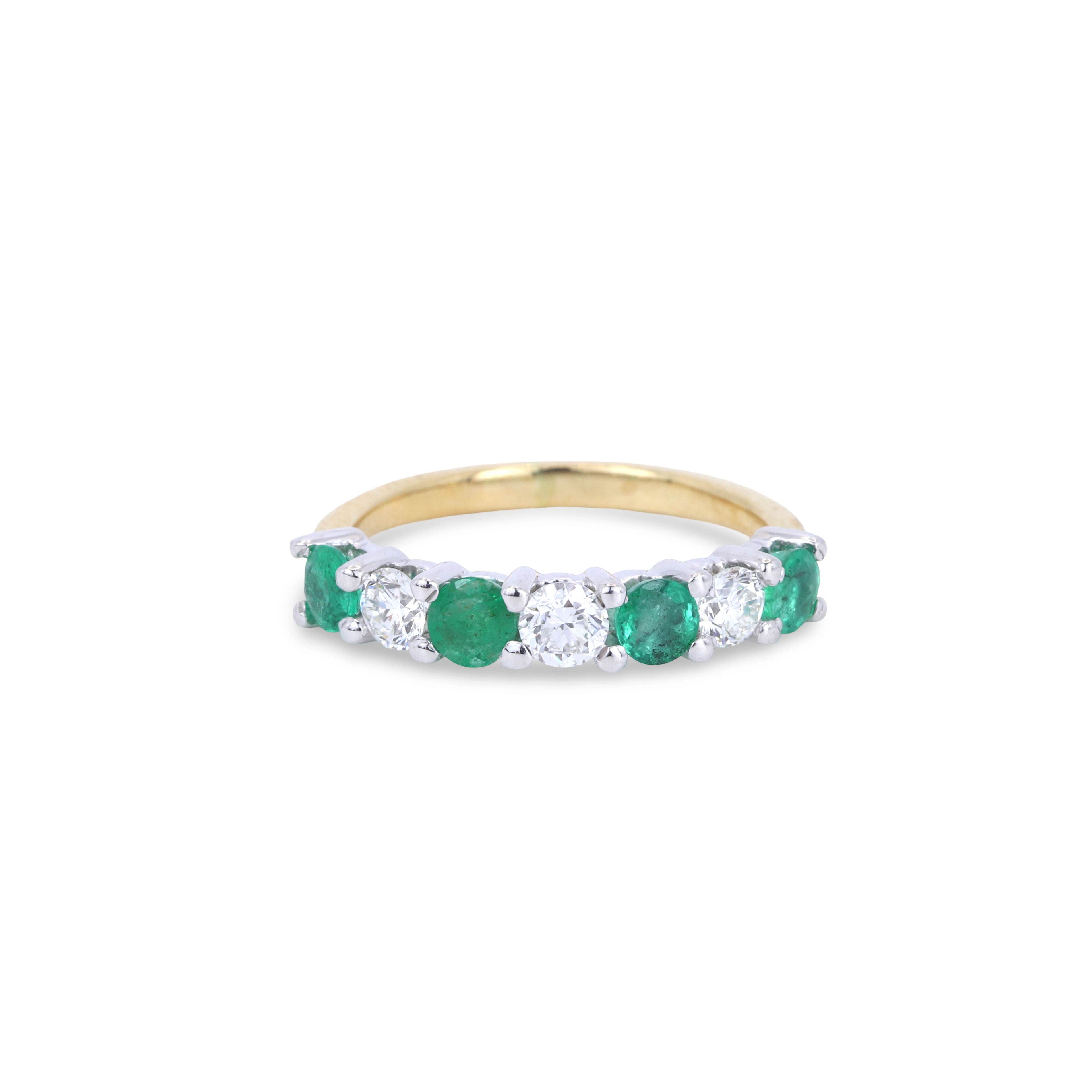 18CT GOLD EMERALD & DIAMOND RING.