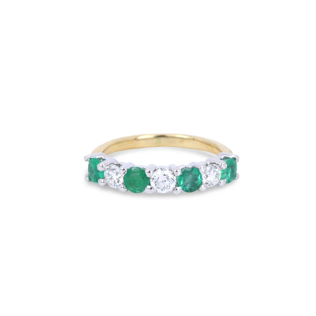 18CT GOLD EMERALD & DIAMOND RING.