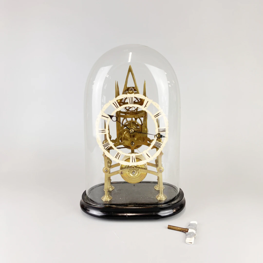 ANTIQUE SKELETON CLOCK.