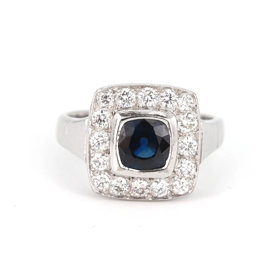 18CT GOLD DIAMOND & SAPPHIRE RING.