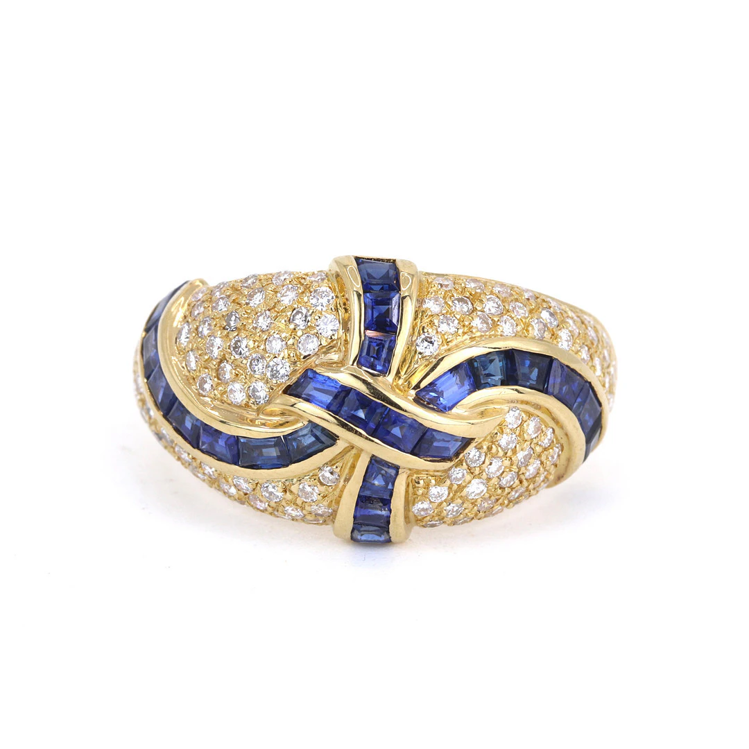 18CT GOLD SAPPHIRE & DIAMOND RING.