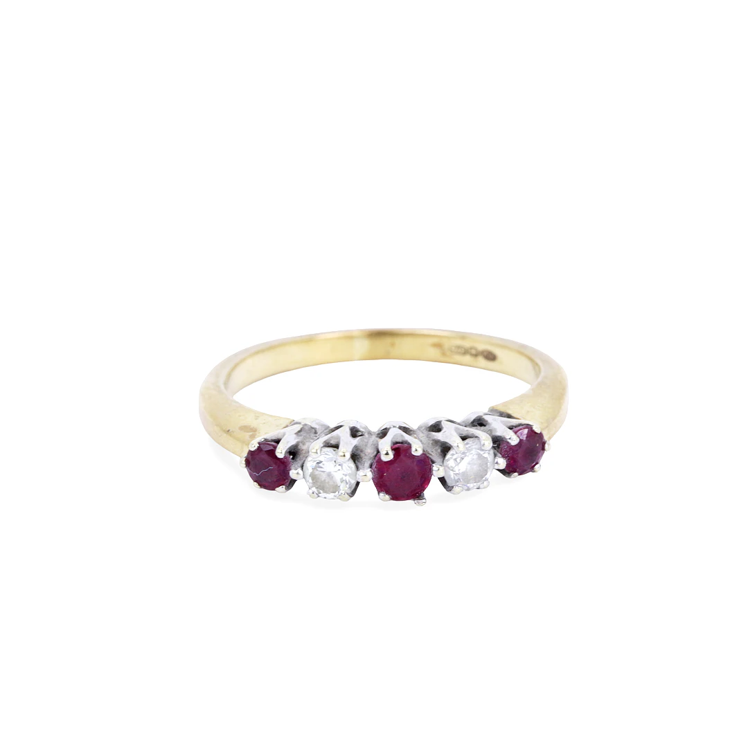 RUBY AND DIAMOND HALF ETERNITY RING.