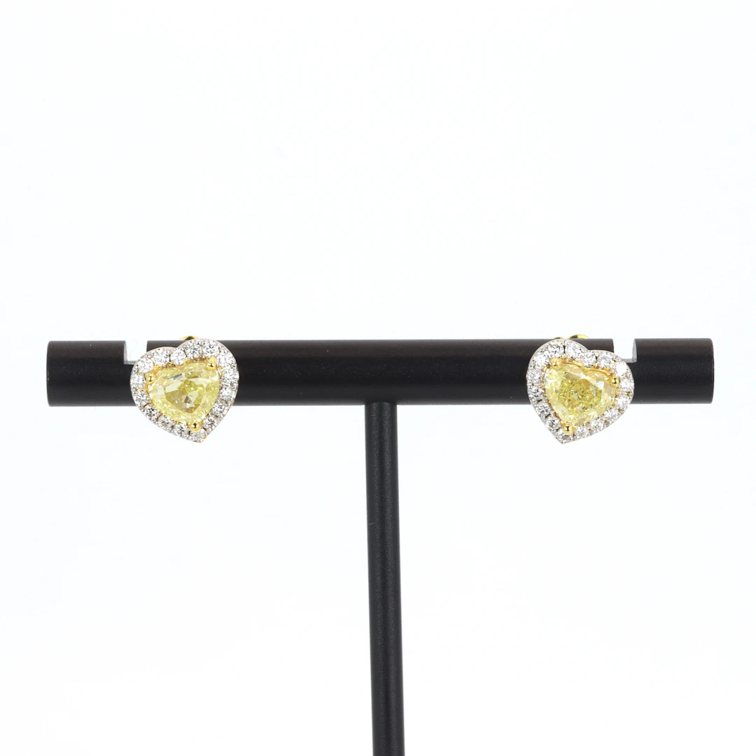 18CT 2.04 CENTRE YELLOW DIA STUD EARRINGS.