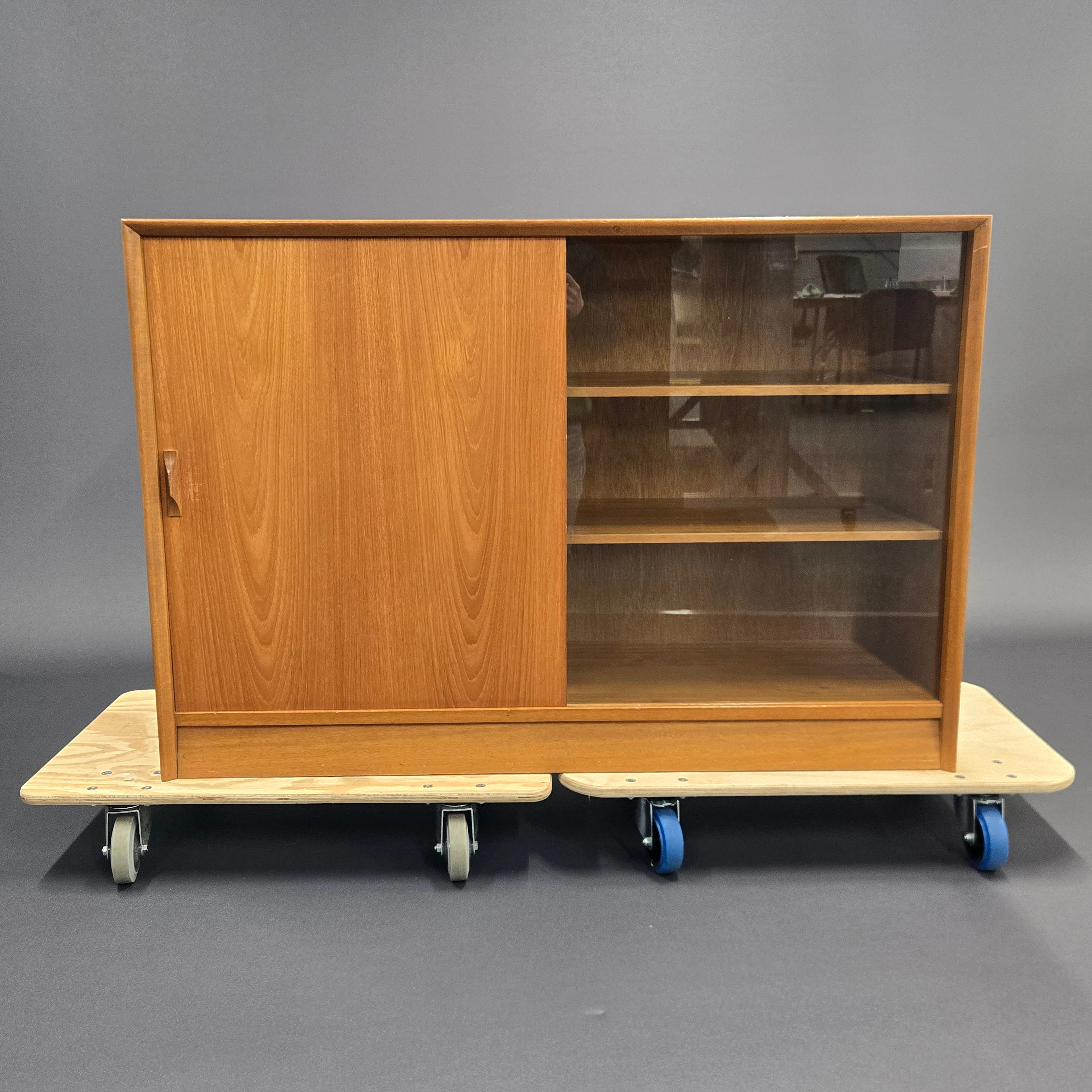 HERBERT. E. GIBBS TEAK CABINET.