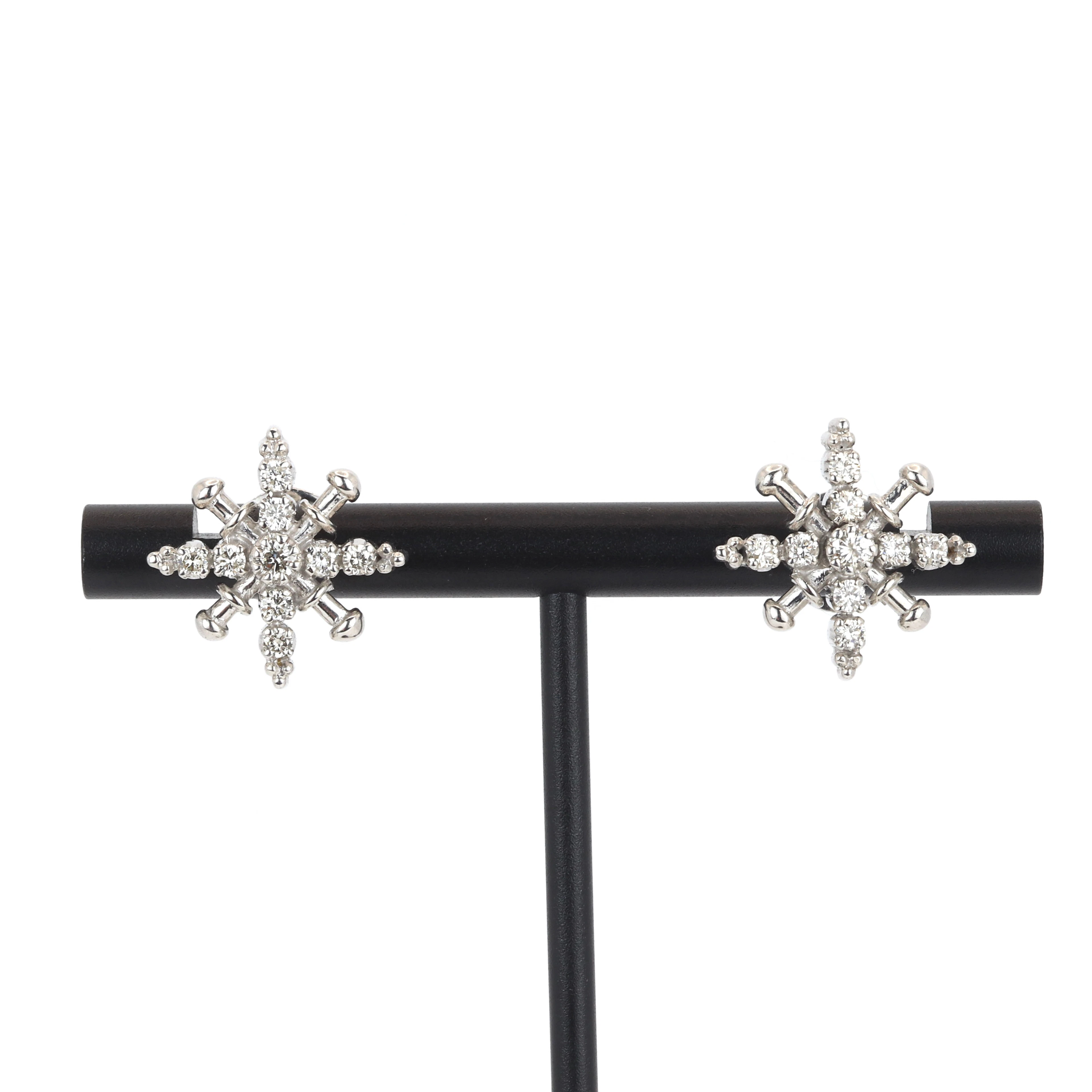 9CT GOLD DIAMOND EARRINGS.