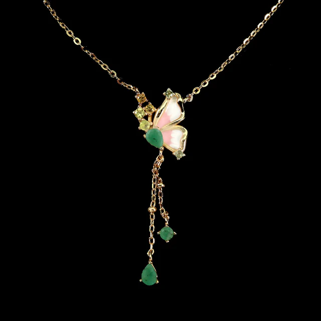 BUTTERFLY EMERALD SILVER GILT NECKLACE.