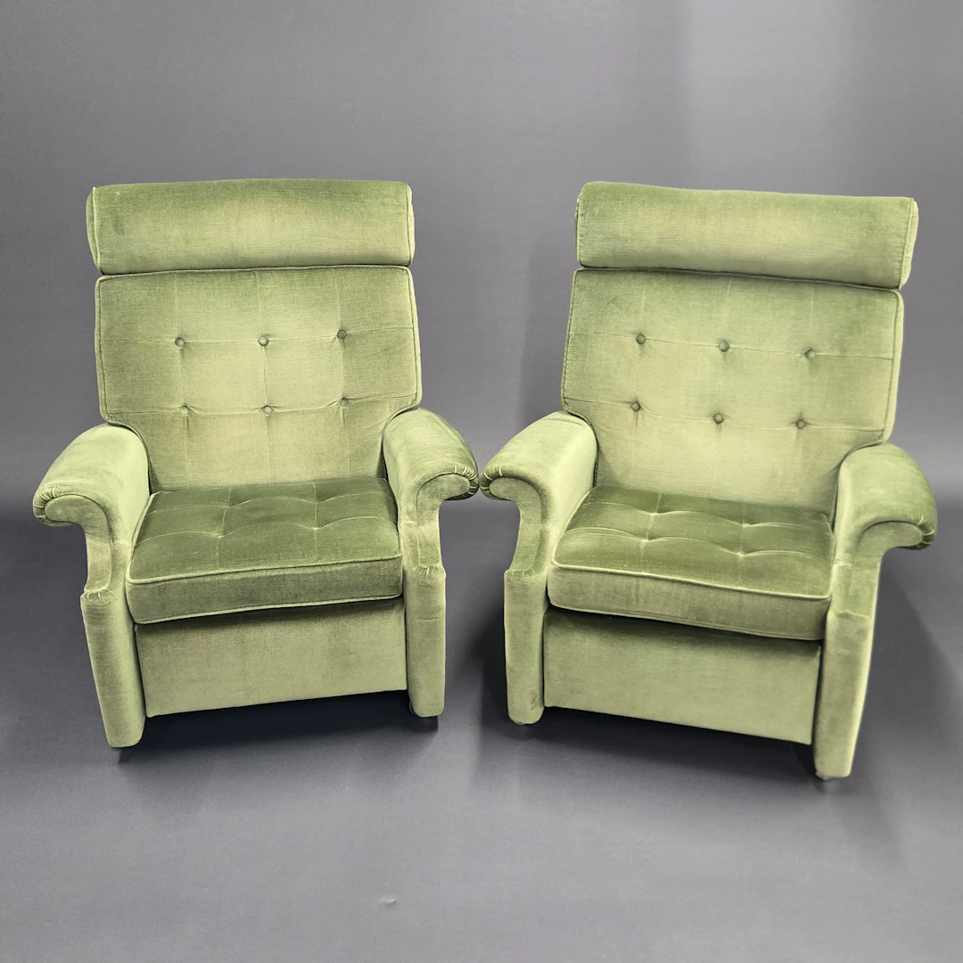 PARKER KNOLL RECLINING ARMCHAIRS.