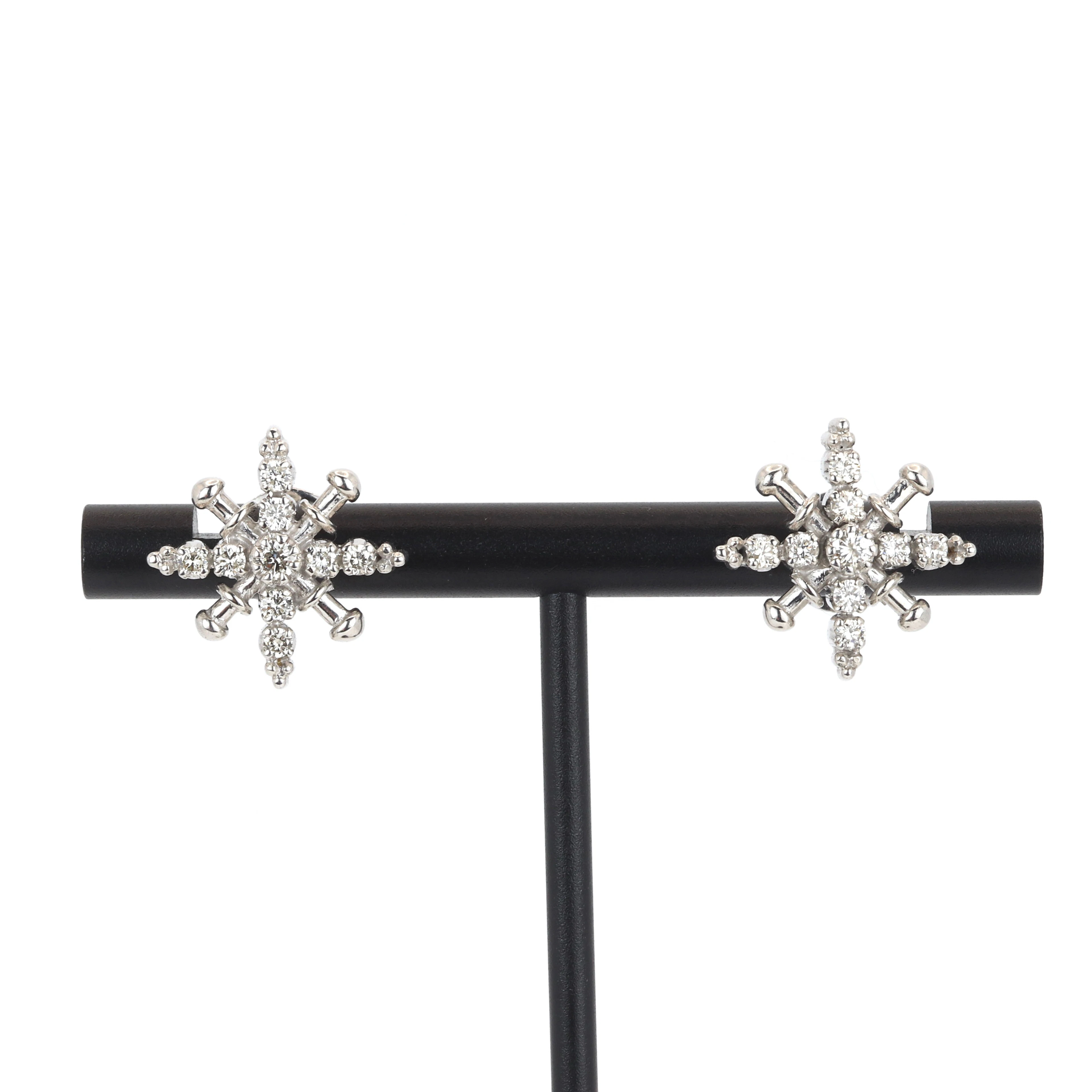9CT GOLD DIAMOND EARRINGS.