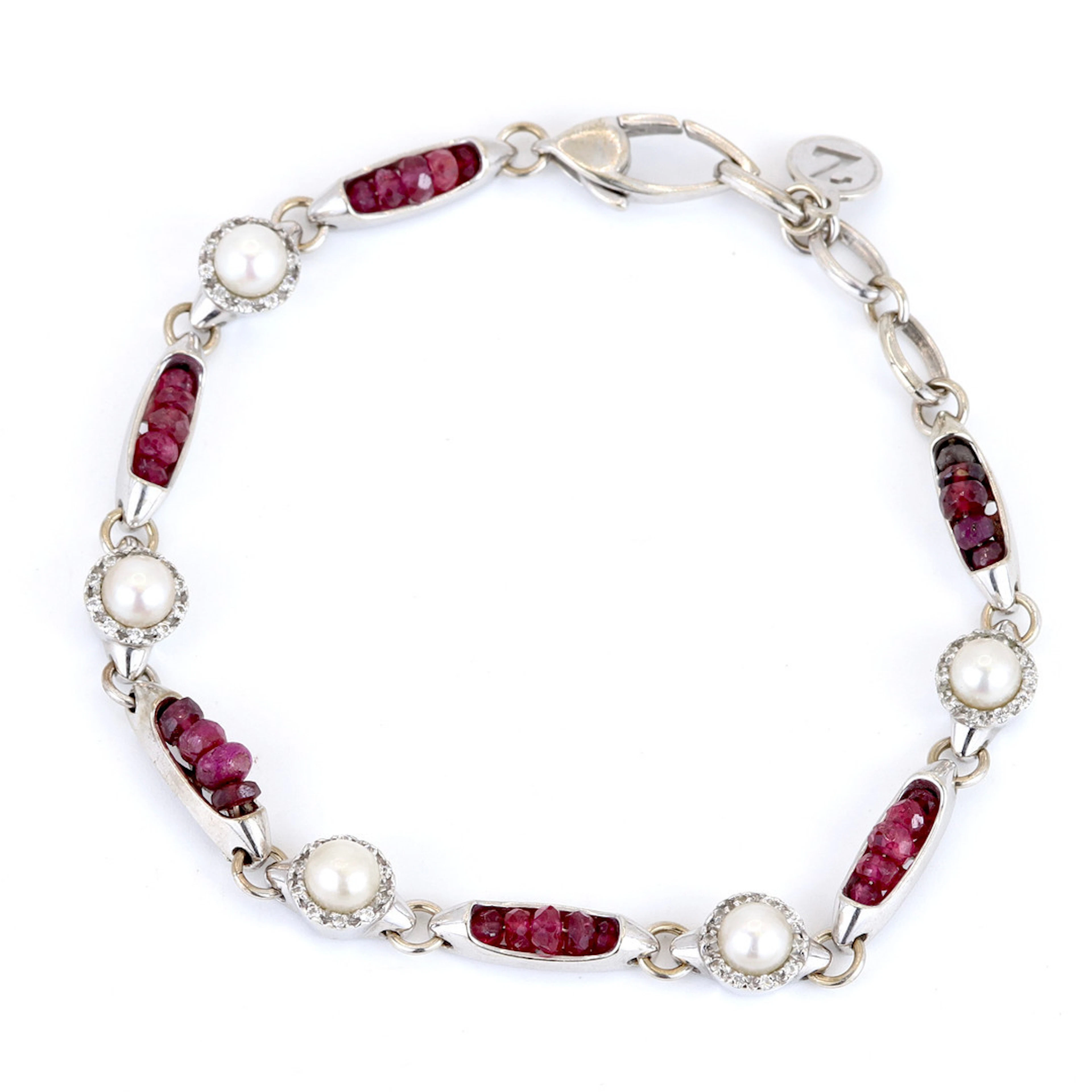 18CT GOLD RUBY, DIAMOND & PEARL BRACELET.