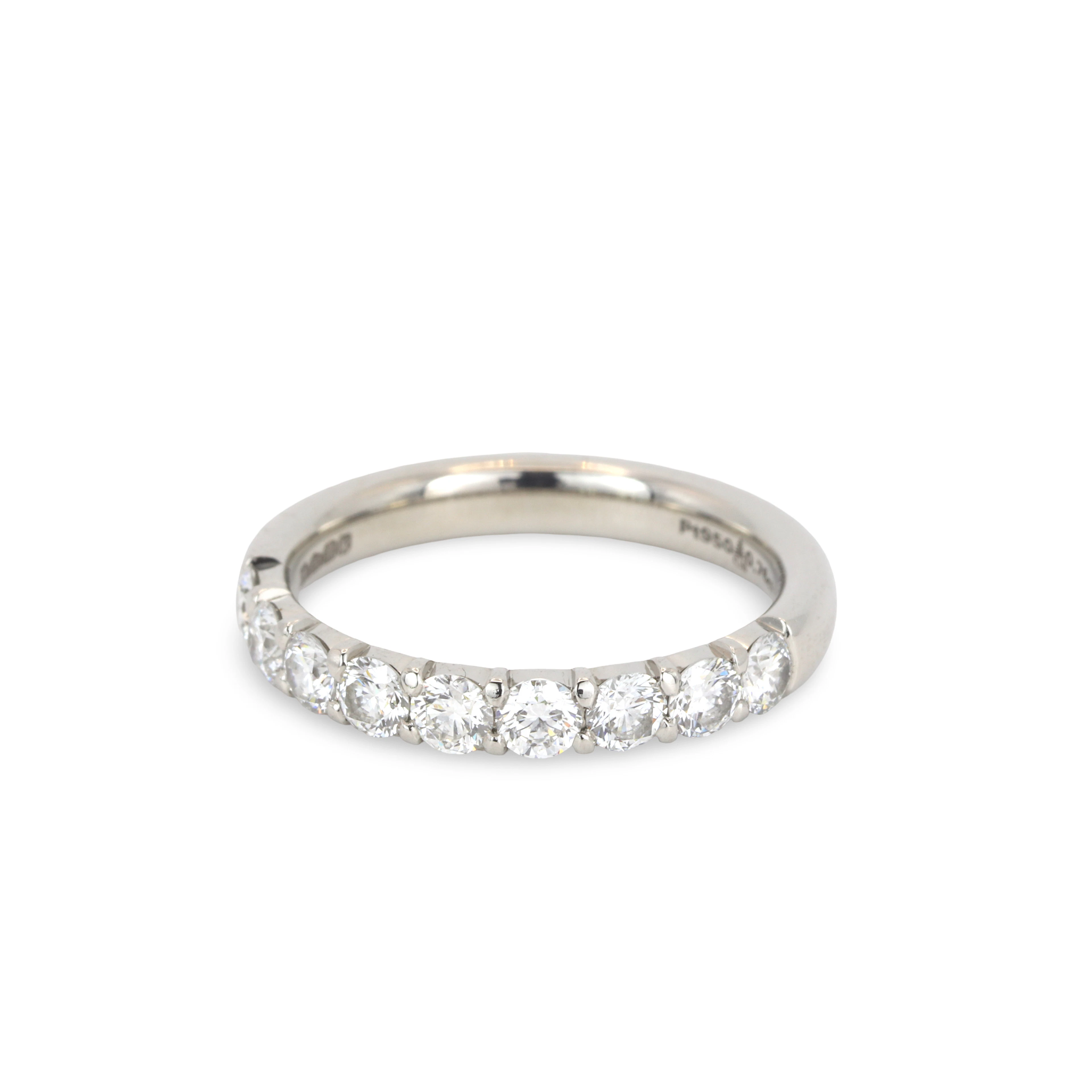 PLATINUM DIAMOND HALF ETERNITY RING.