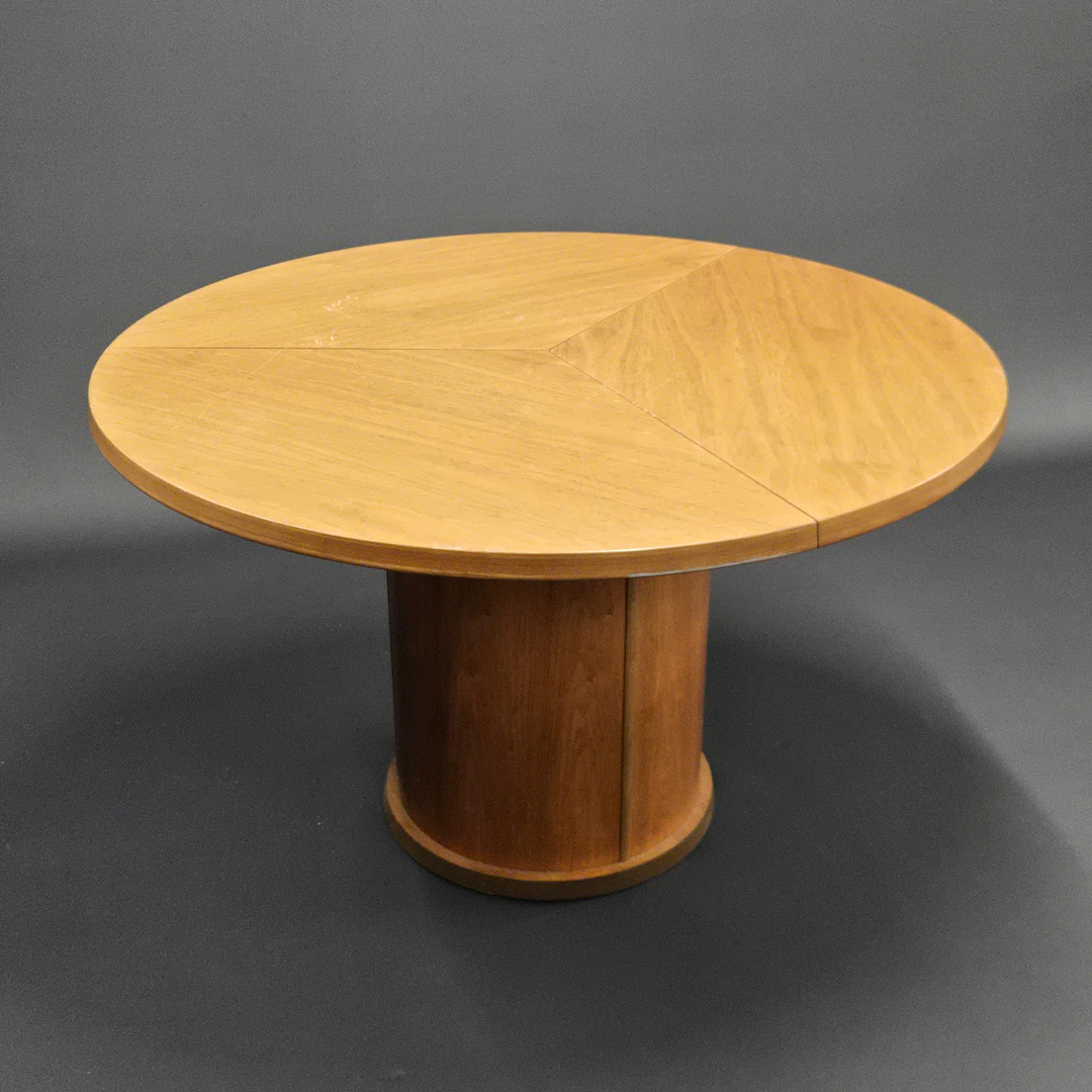 SKOVBY TEAK EXTENDING DINING TABLE.