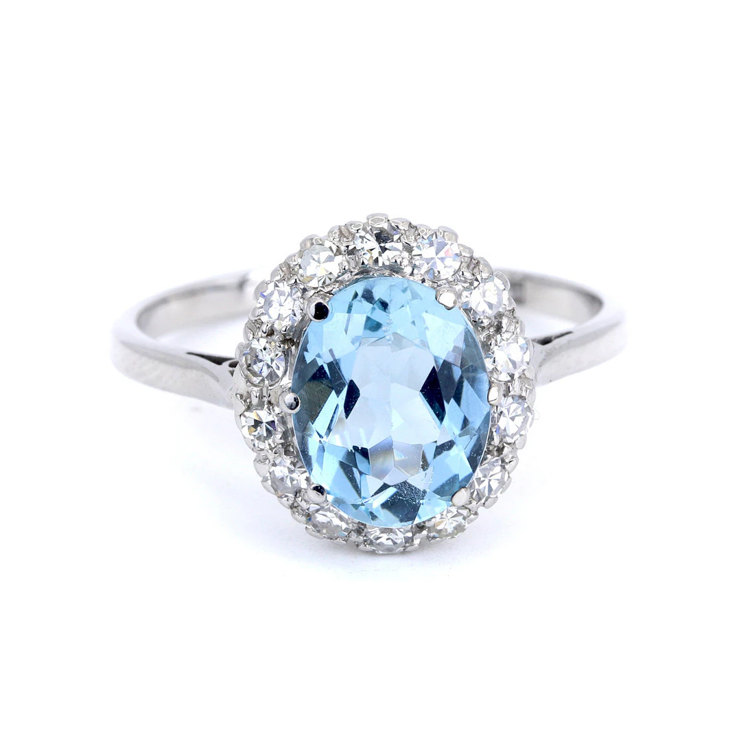 PLATINUM & 18CT GOLD AQUAMARINE & DIAMOND RING.