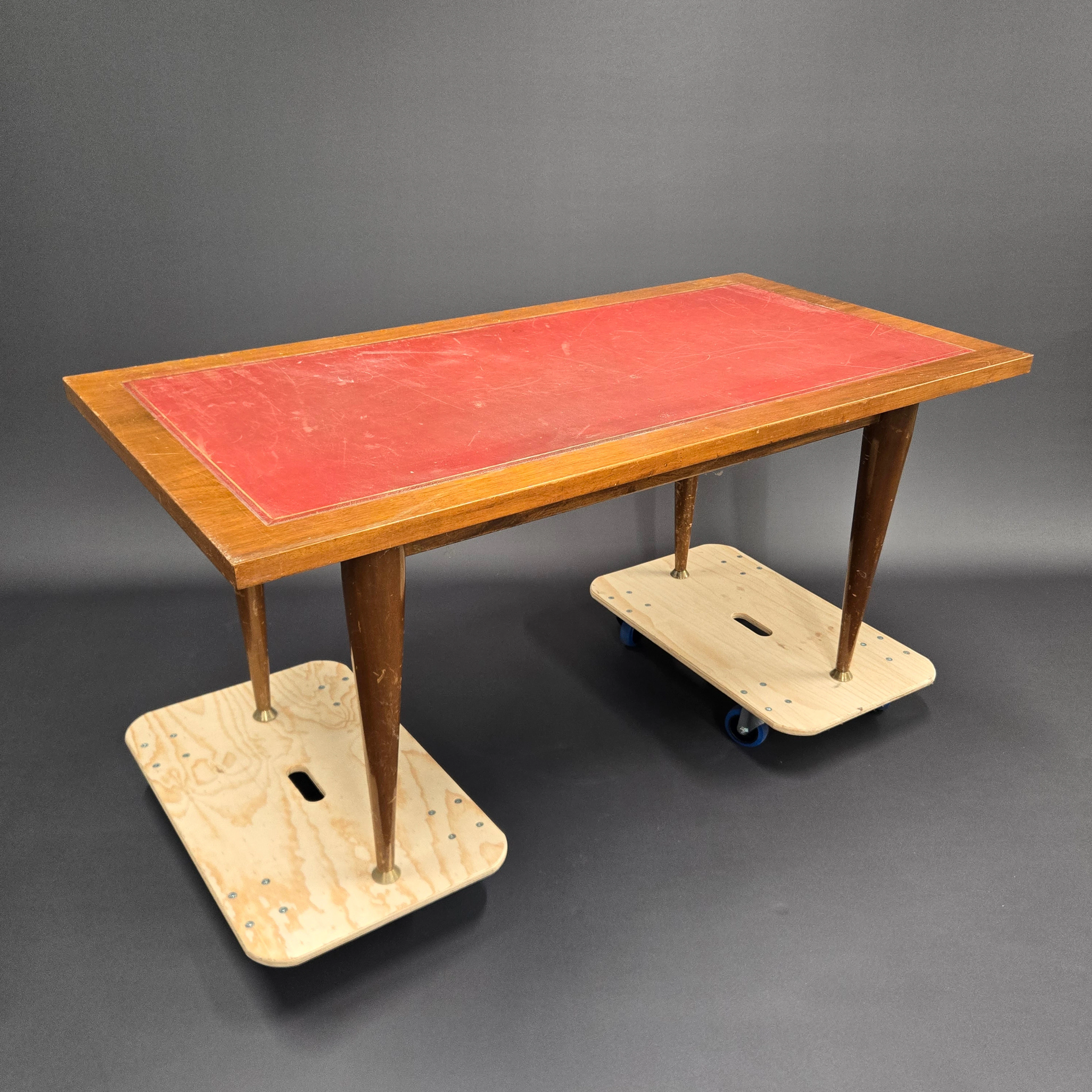 LEATHER TOPPED TABLE.