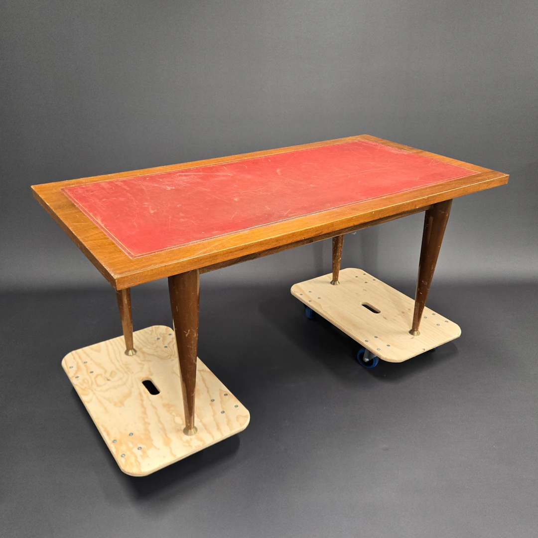 LEATHER TOPPED TABLE.